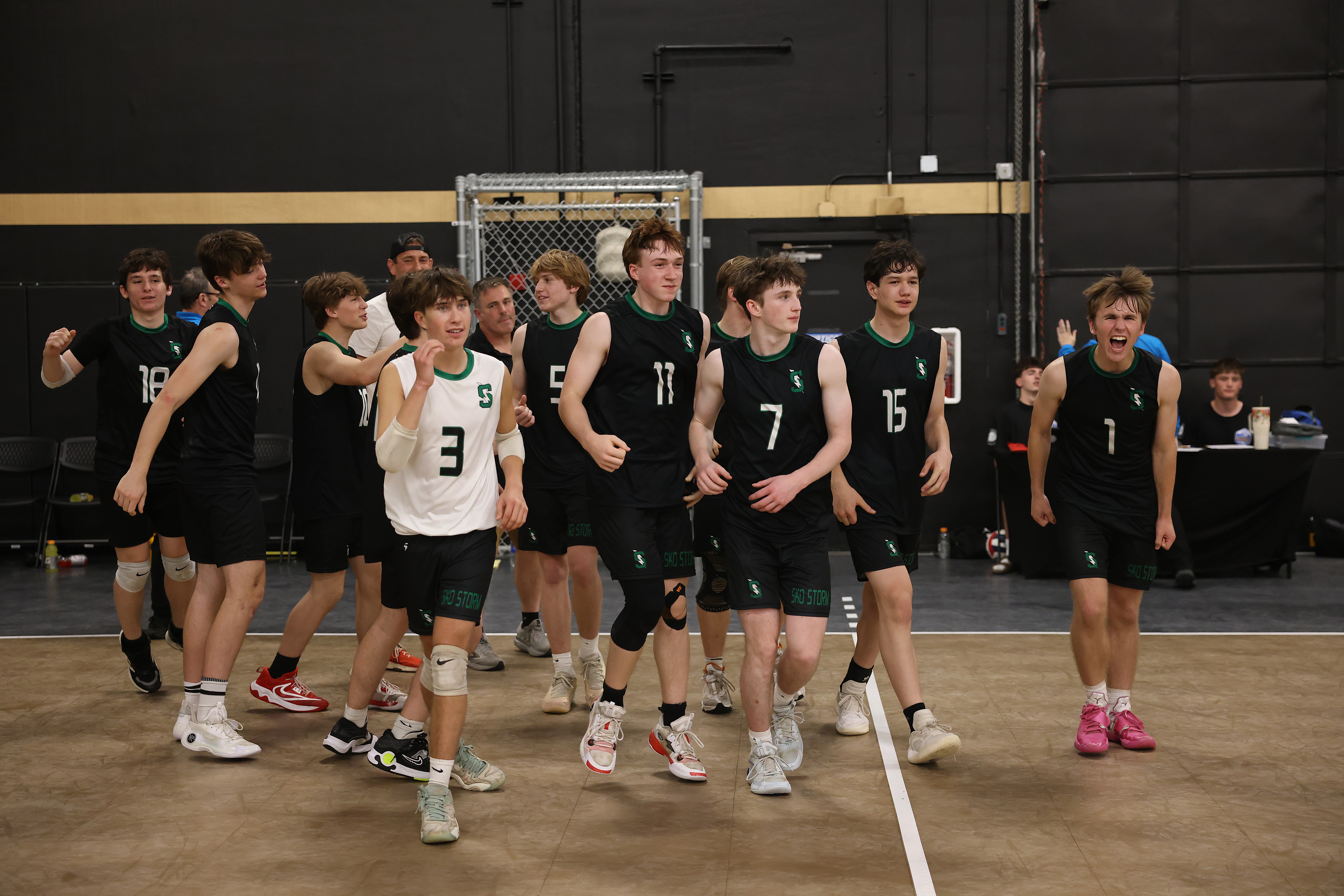 The Summit High School boys volleyball team celebrates during the 2025 Boys Volleyball State Championship at Olympus Sports Center in Hillsboro, Ore., on May 25, 2025.