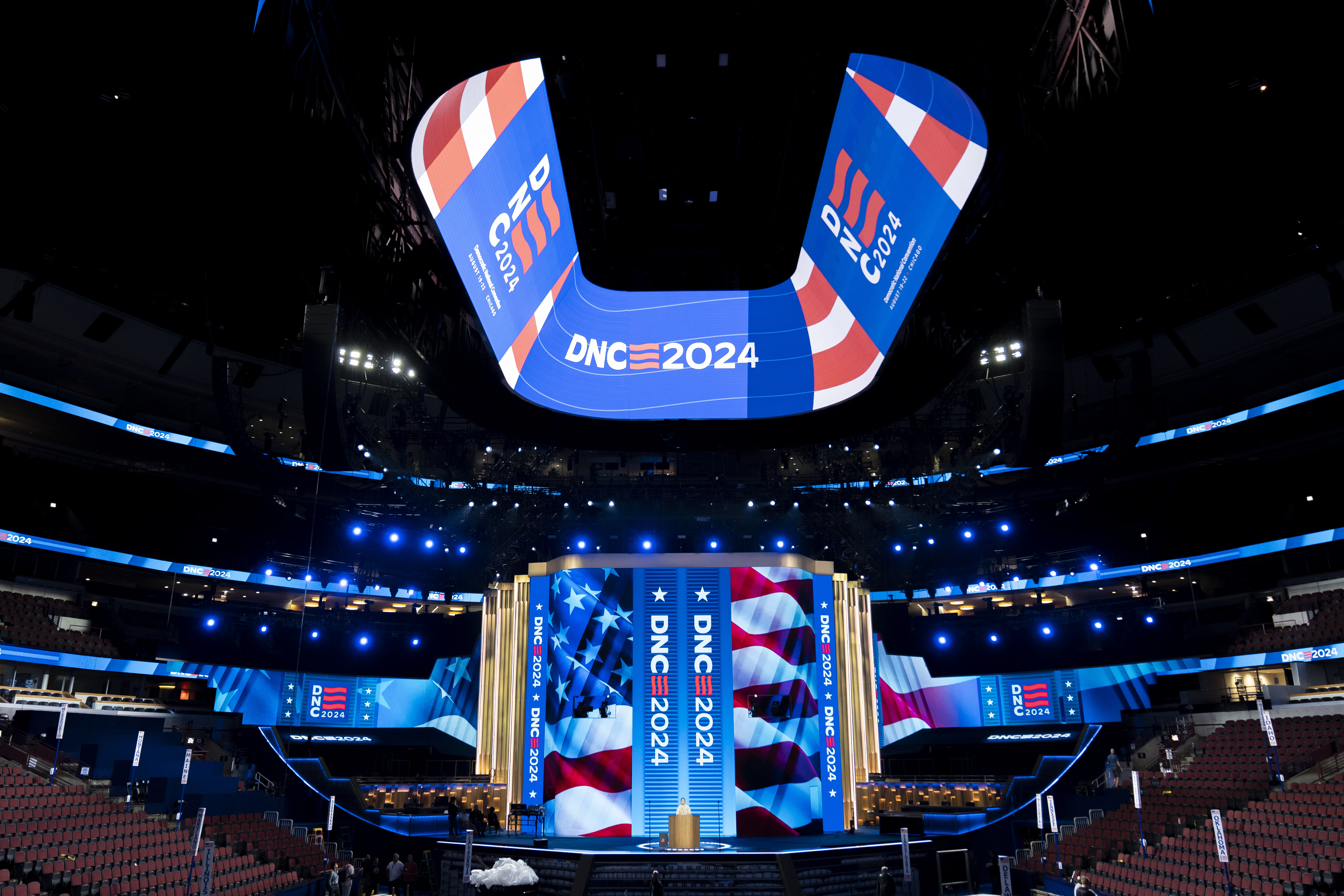 Workers prepare the United Center before the upcoming Democratic National Convention, Wednesday, Aug. 14, 2024, in Chicago.