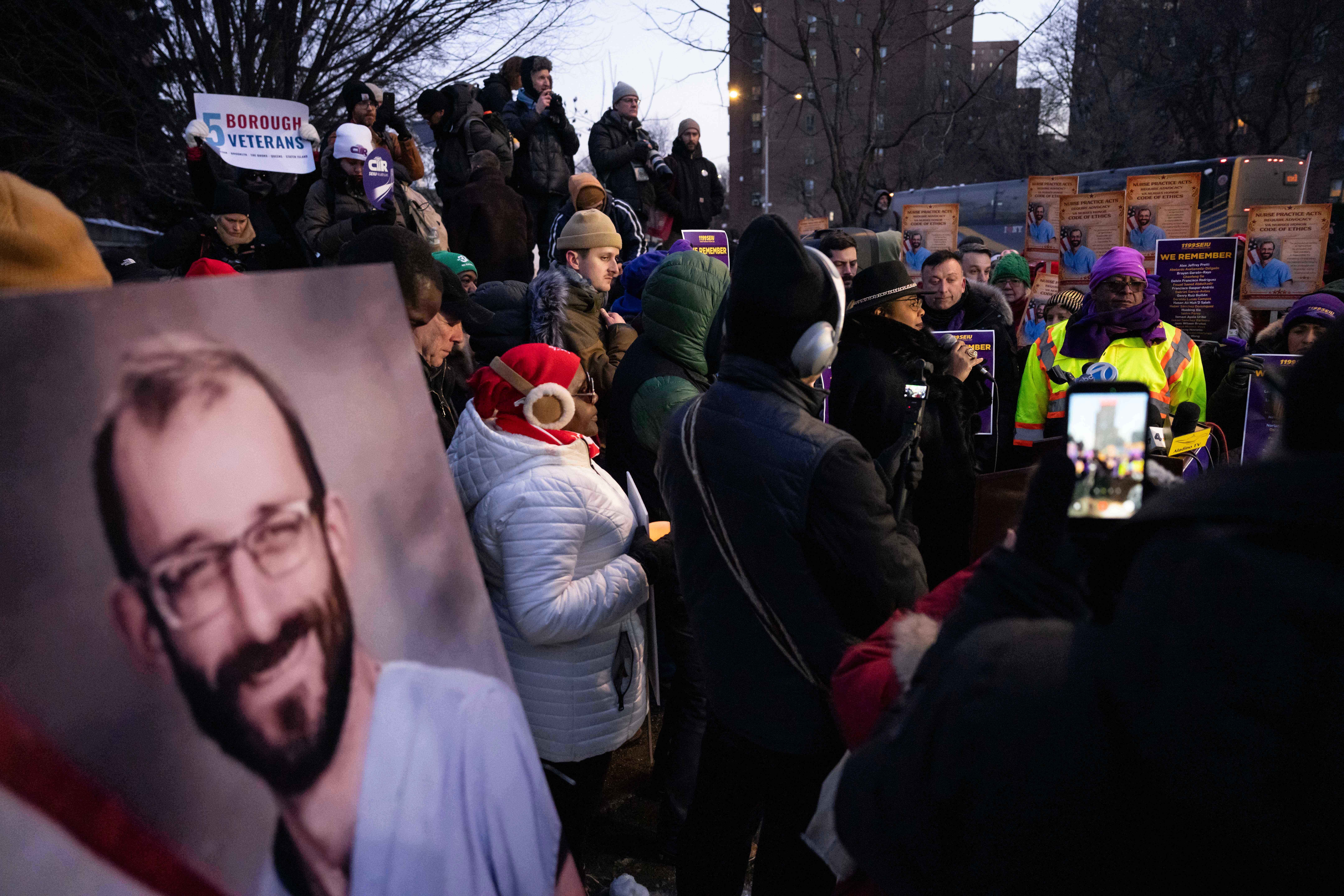 A photo of Alex Pretti is displayed during a vigil for Alex Pretti by nurses and their supporters outside VA NY Harbor Healthcare System, Thursday, Jan. 29, 2026, in New York.