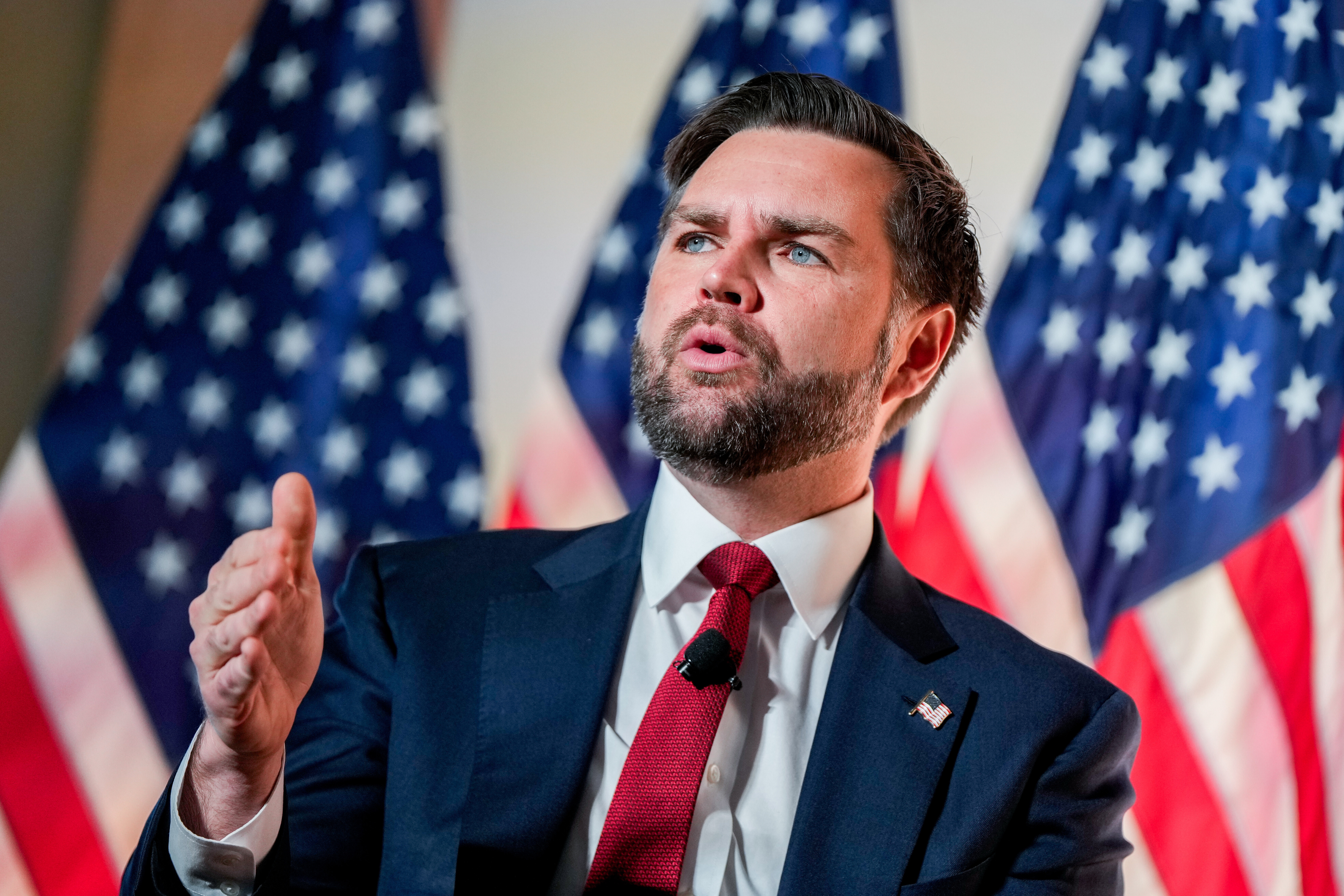 FILE - Vice President JD Vance speaks with Breitbart News Washington bureau chief Matthew Boyle at Andrew W. Mellon Auditorium, Nov. 20, 2025, in Washington.