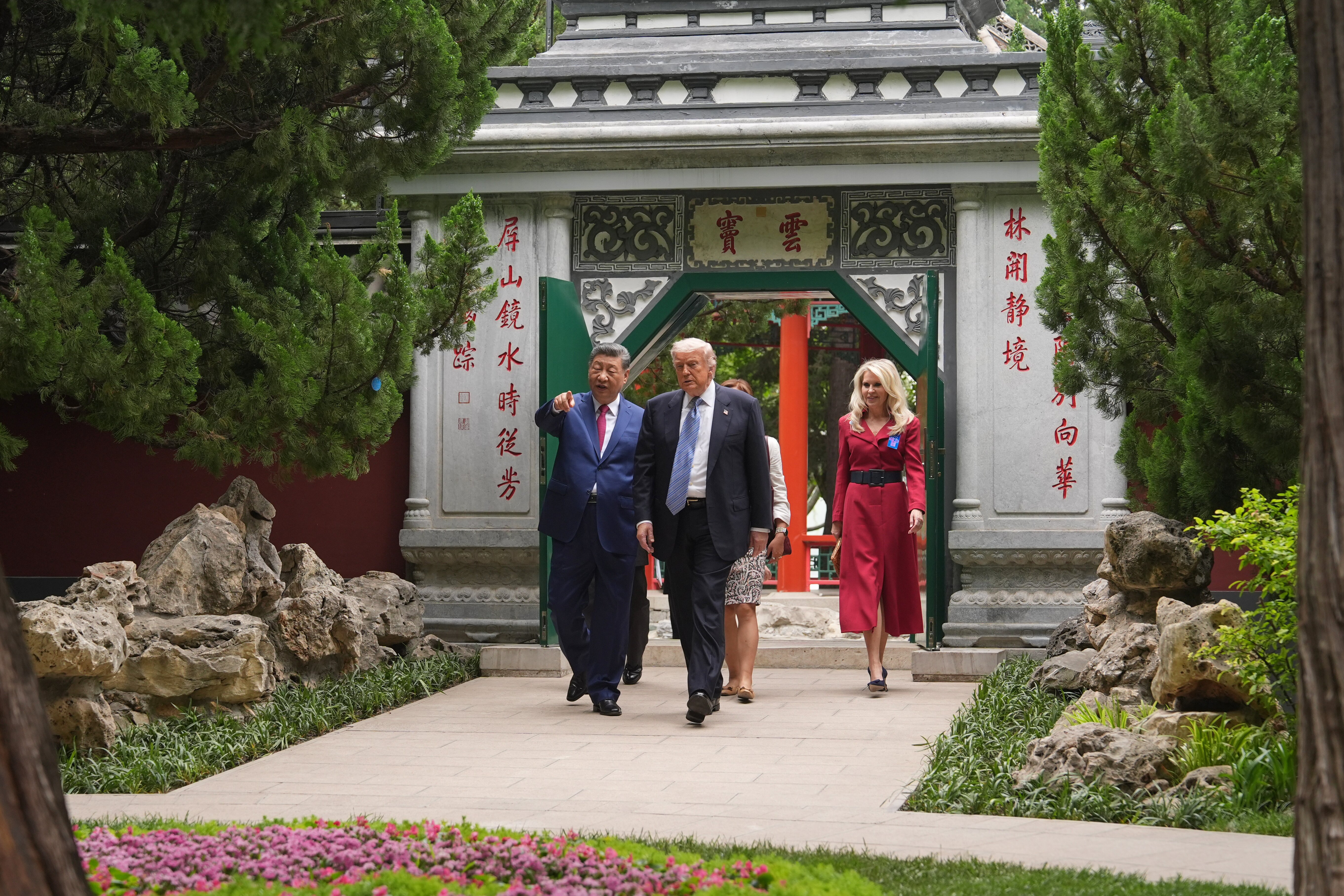 President Trump and Chinese President Xi Jinping tour the Zhongnanhai leadership compound on May 15 in Beijing.