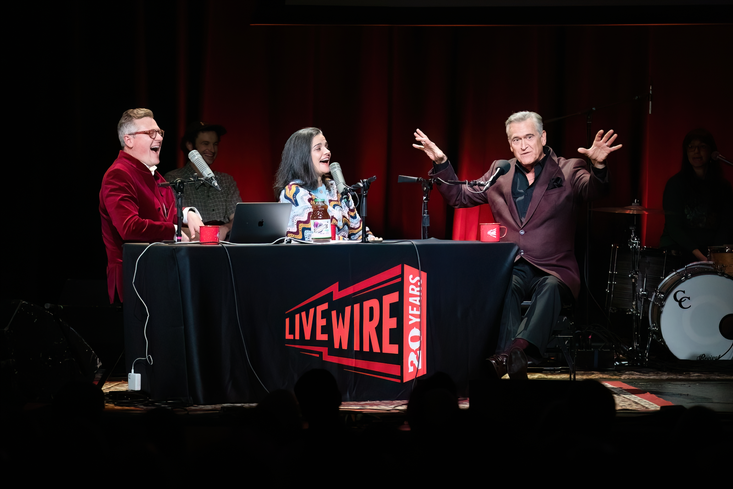 Live Wire's Luke Burbank and Elena Passarello interview actor and filmmaker Bruce Campbell during the variety show's 20th year, at Revolution Hall in Portland, Oregon, on Dec. 24, 2024.