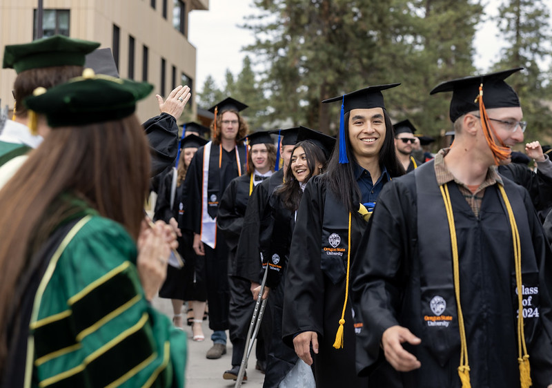 Graduates celebrate at Oregon State University-Cascades in Bend on June 18, 2024. Tuition at the state’s largest public university will rise more than 5% for freshman next year.
