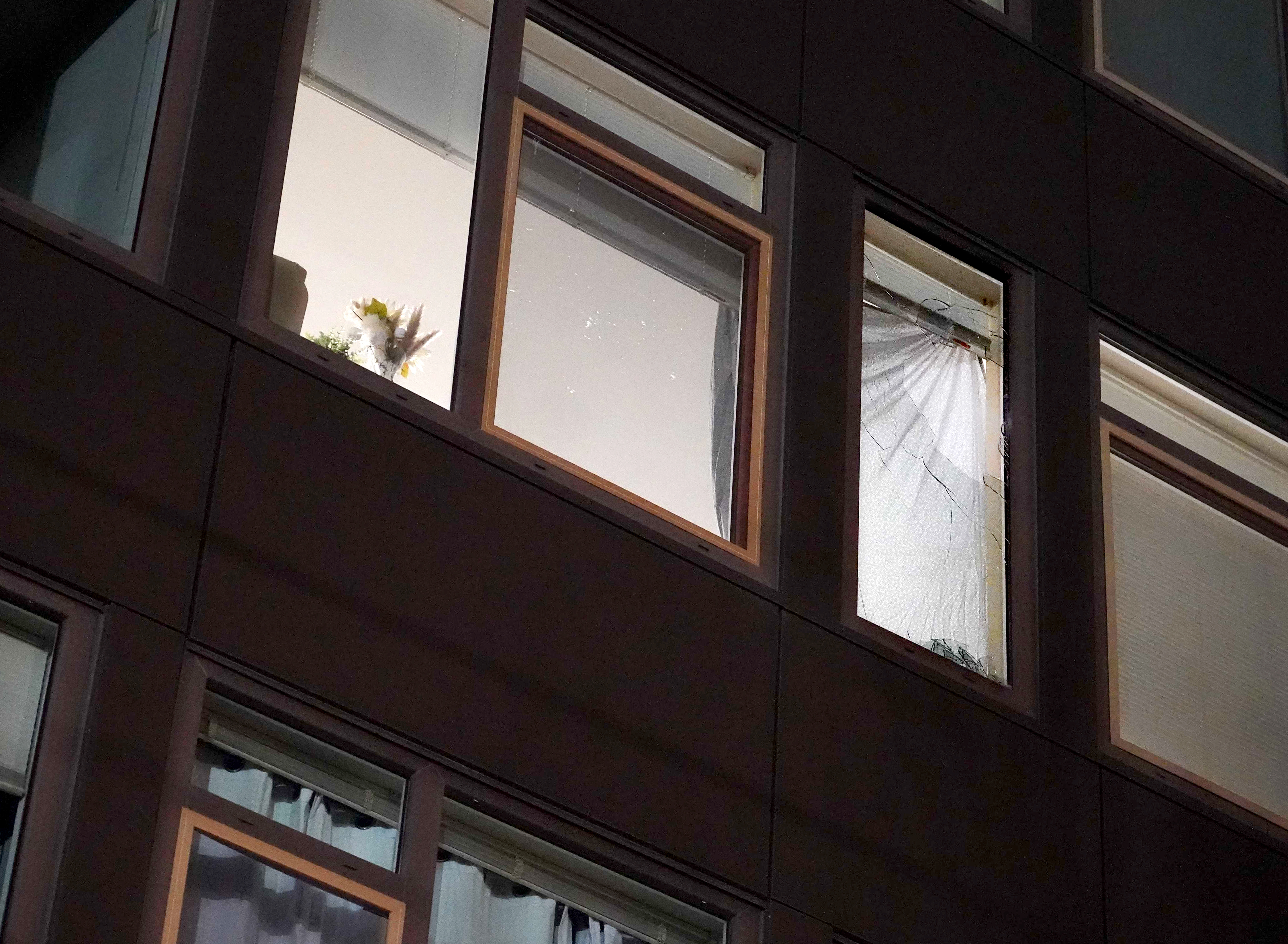 A window broken in a Gray’s Landing apartment as a result of a crowd control munition from the U.S. Immigration and Customs Enforcement facility, which is across the street, in Portland, Ore., on Jan. 31, 2026. Federal officers used crowd control munitions, which included chemical and projectile munitions, that evening.