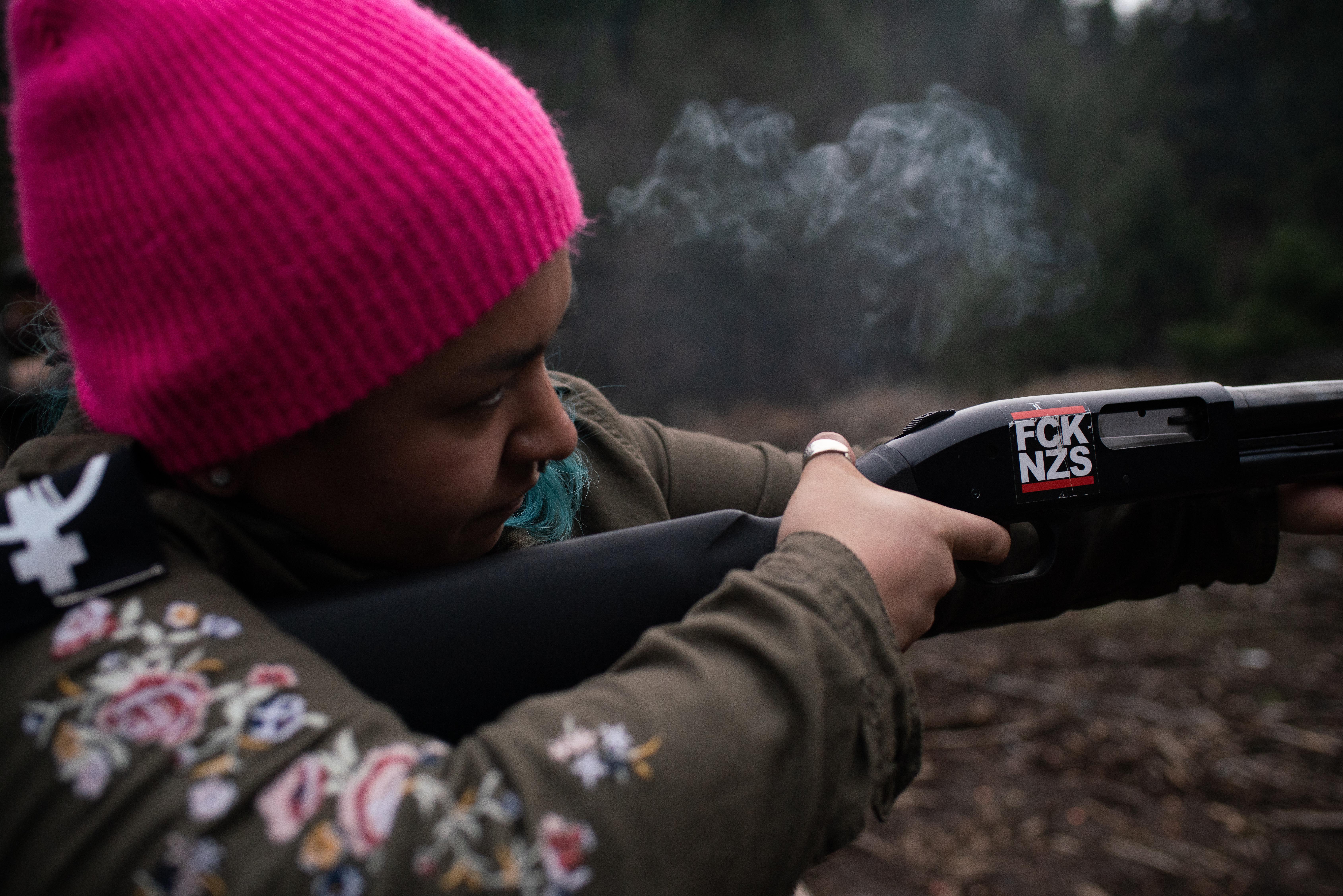 Rosie Strange, a leftist activist who chose to buy a handgun for self defense, fires a friend’s shotgun on February 2, 2019, in Hood River, Oregon.