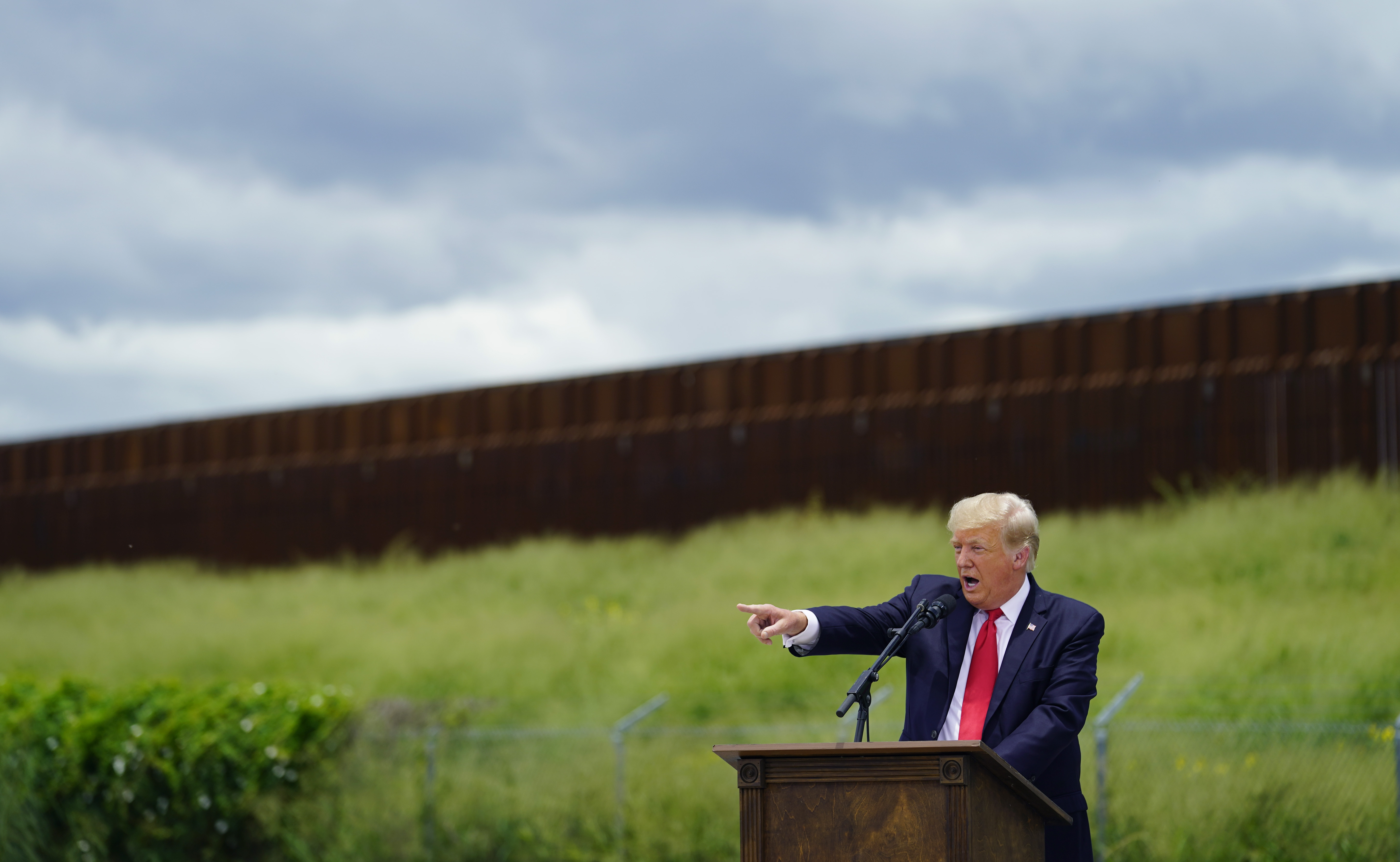 Trump uses trip to border to assail Biden on immigration - OPB