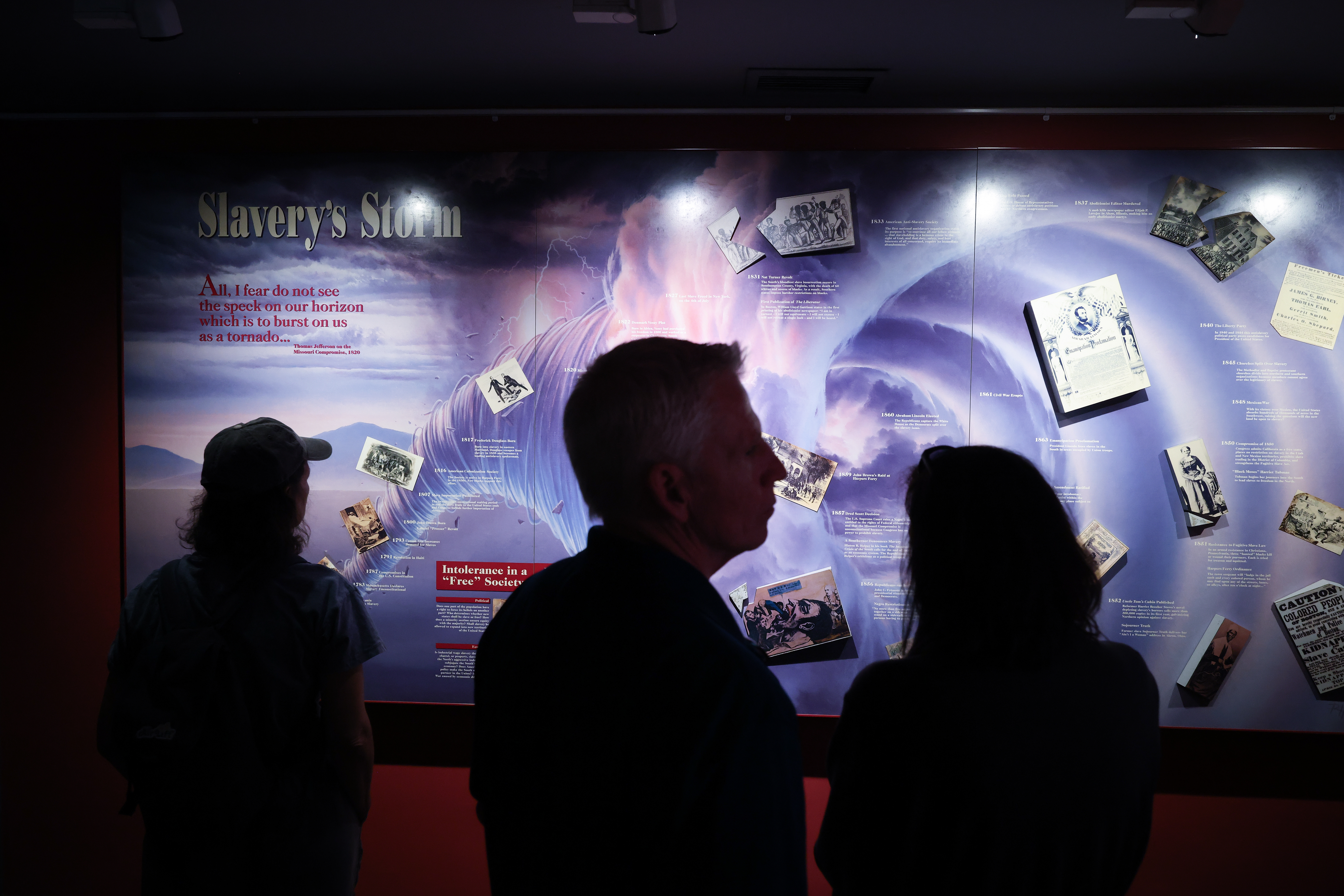 Visitors view exhibits related to slavery at the John Brown Museum at the Harpers Ferry National Historical Park in Harpers Ferry, West Virginia. According to Marilyn Jackson, CEO of the American Alliance of Museums, President Trump's actions towards museums has led to a decrease in philanthropic funding.
