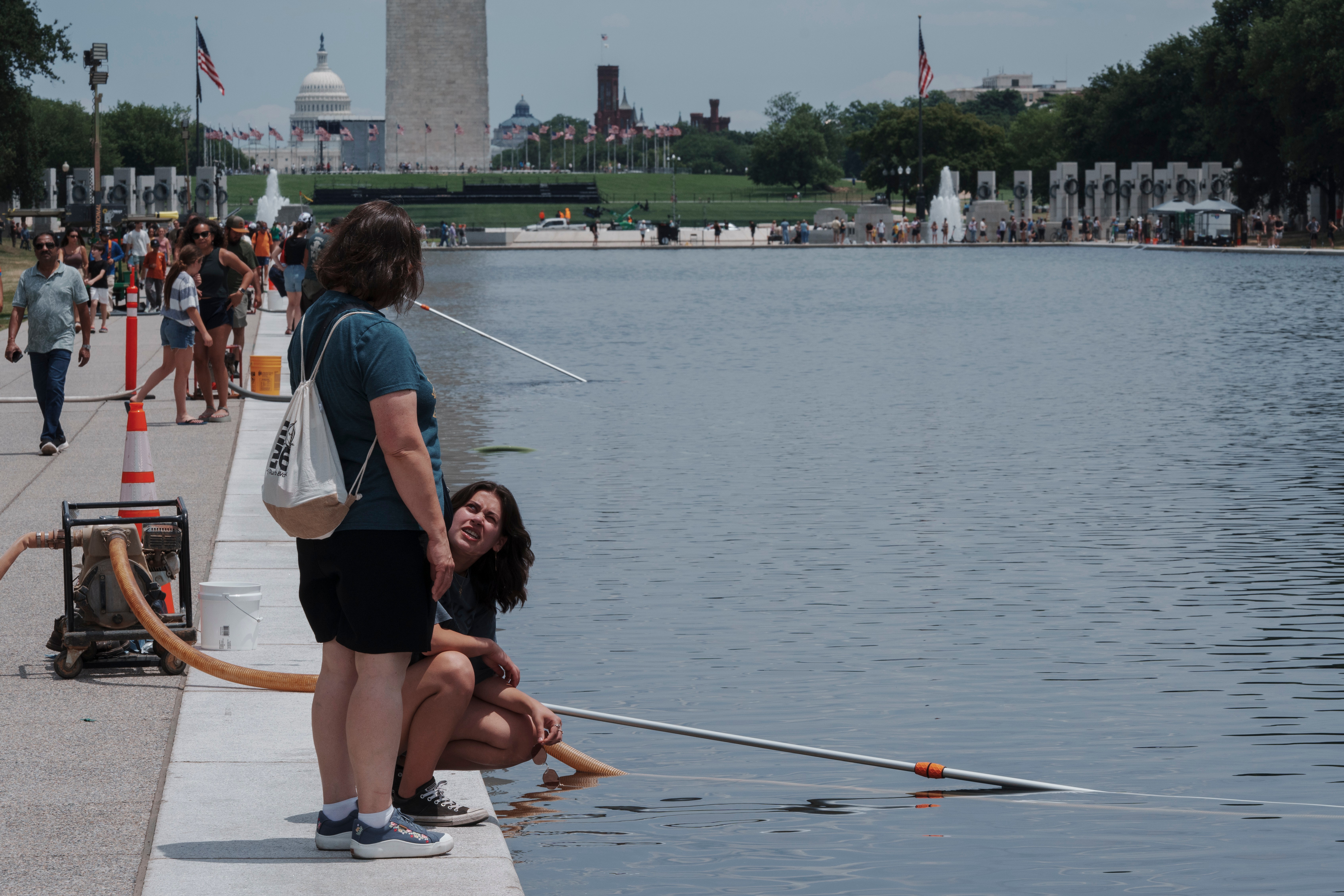 Reflecting Pool liner was cut with a sharp knife or razor, National ...