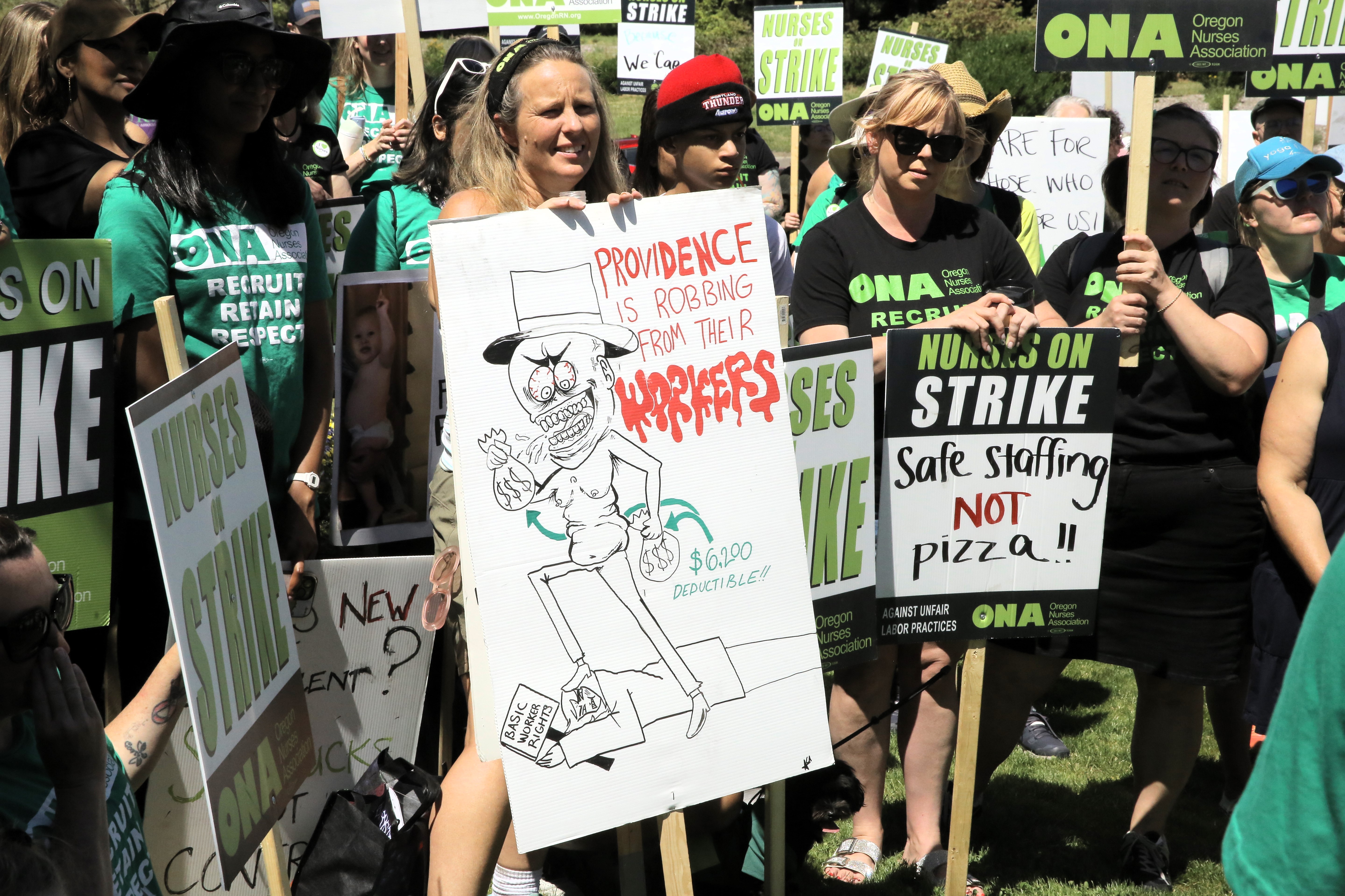 The Oregon Nurses Association continues picketing at Providence St. Vincent in Southwest Portland, Thursday, June 20, 2024.