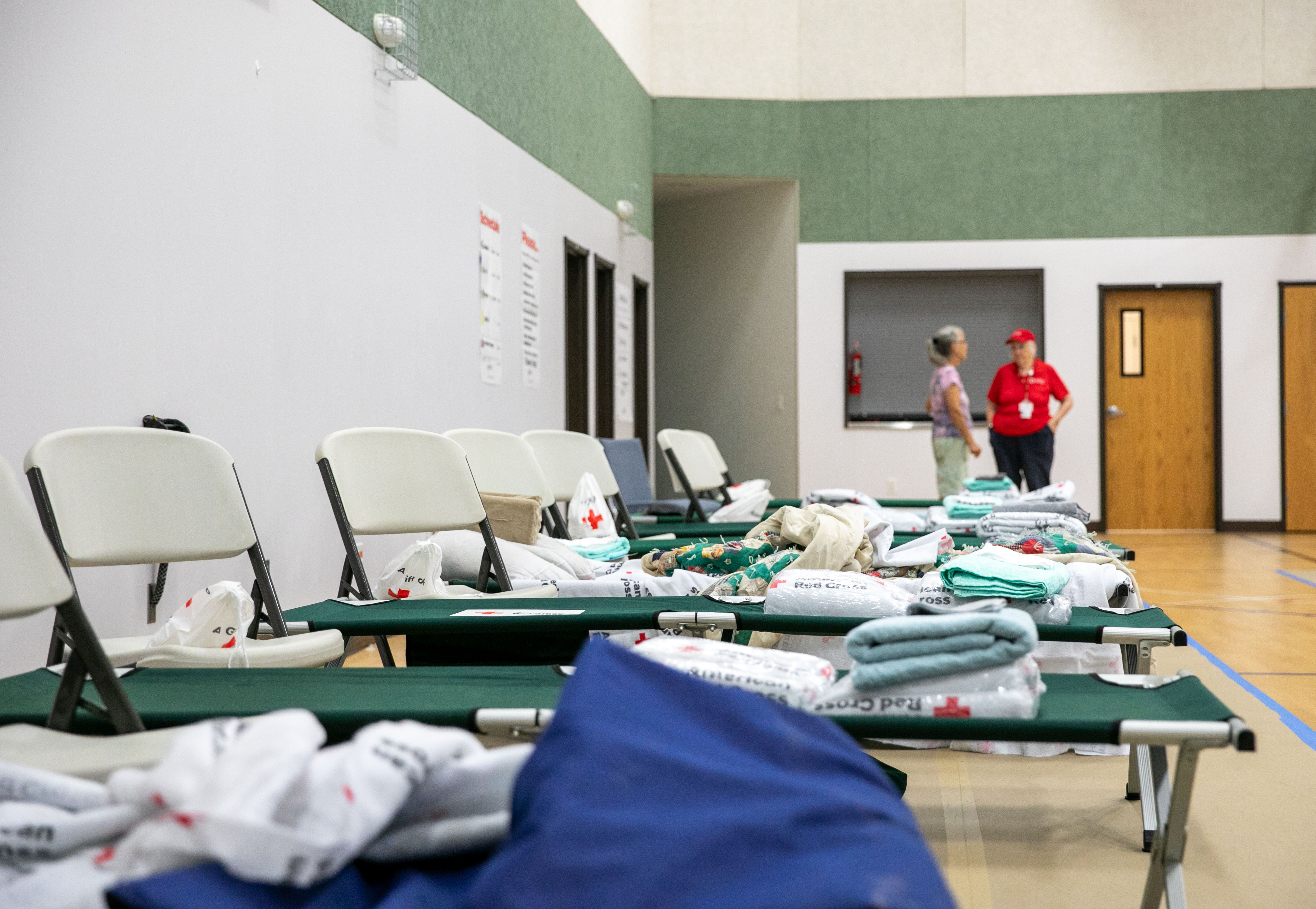 Cots and supplies in a Red Cross shelter for Burdoin wildfire victims located in the Grace Baptist Church in White Salmon, Wash., July 24, 2025. Overnight, damages to local homes and properties have continued to rise following a worsening in weather conditions. 