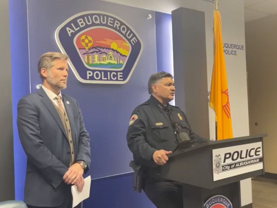"We're worried and concerned that these are connected and possibly politically motivated or personally motivated," Albuquerque Mayor Tim Keller, left, said earlier this month of a string of shootings. He's seen here alongside Police Chief Harold Medina during a press conference via the Albuquerque Police Department's Facebook livestream.