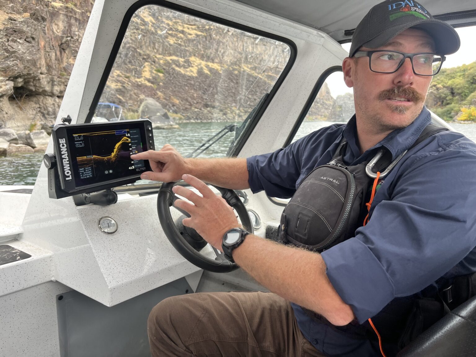 Jeremey Varley, the Idaho State Department of Agriculture’s southern chief treatment engineer, explains the state’s strategy for eradicating invasive quagga mussels during a boat tour of the infested portion of the Snake River on Oct. 3.