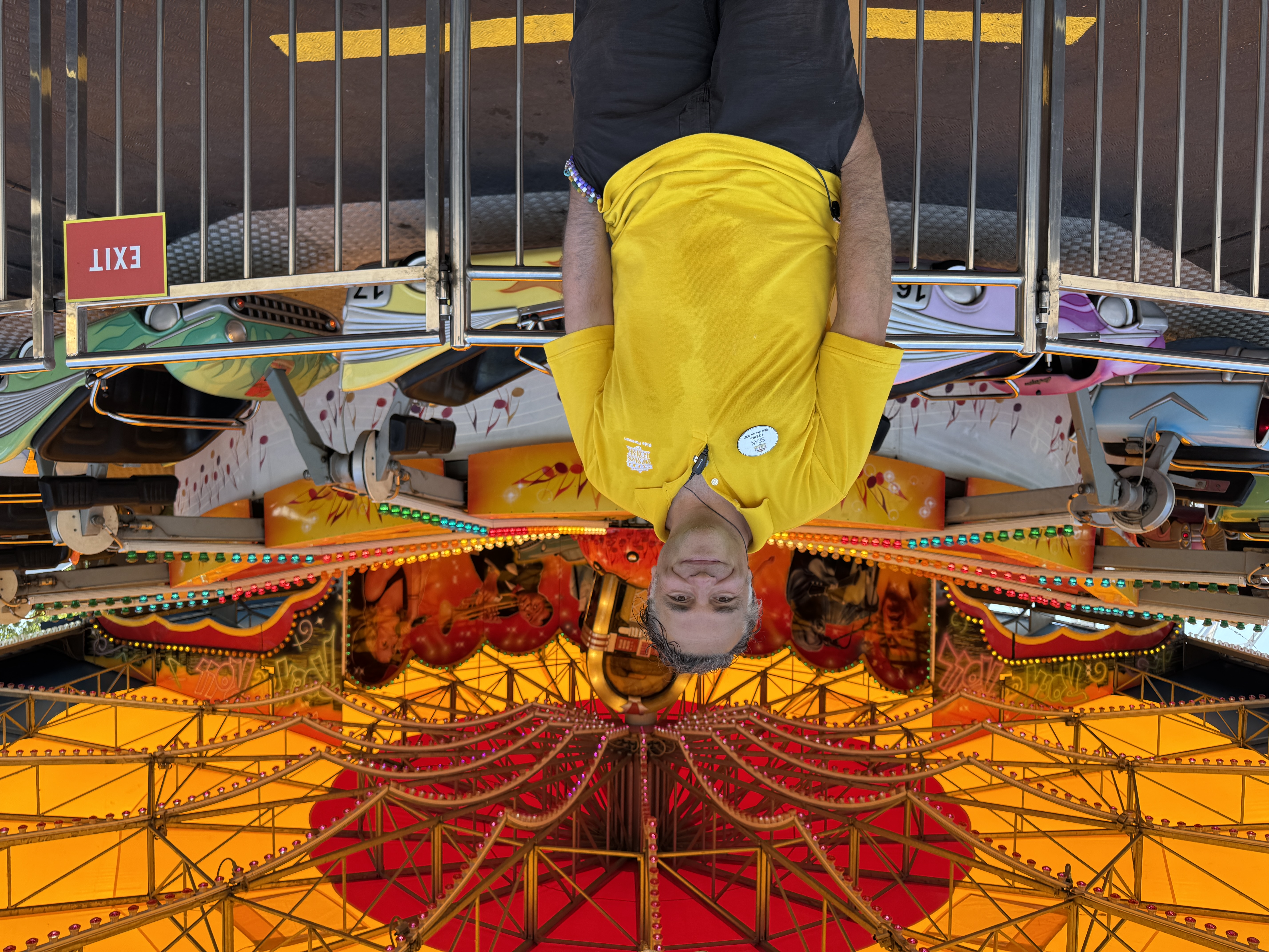 Sean Strauss, ride foreman at Oaks Amusement Park, stands in font of his favorite ride: the "Rock & Roll."