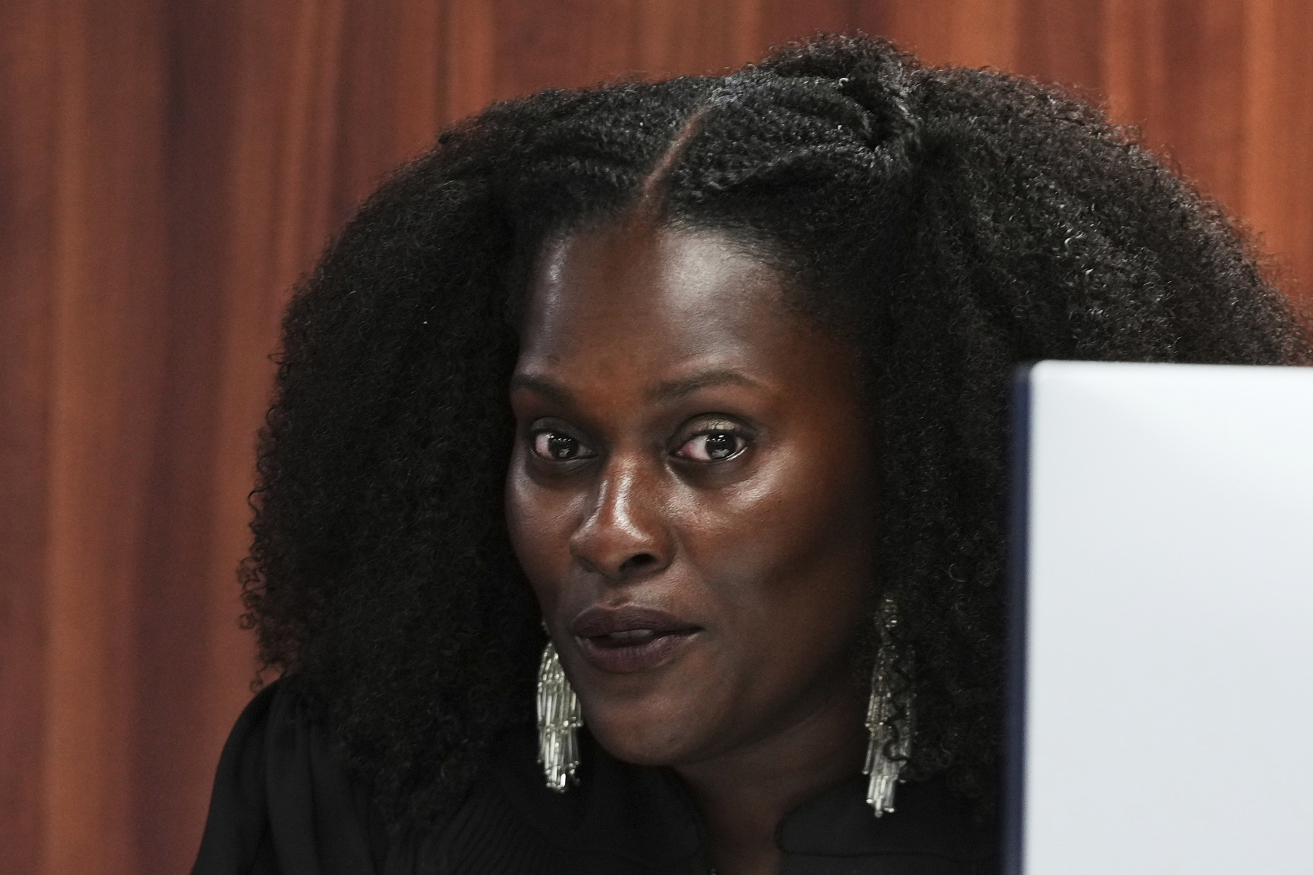 Michigan District Court Judge Kristen Simmons speaks Tuesday in Lansing while dismissing the criminal cases against 15 people accused of acting falsely as electors for Donald Trump in the 2020 election.