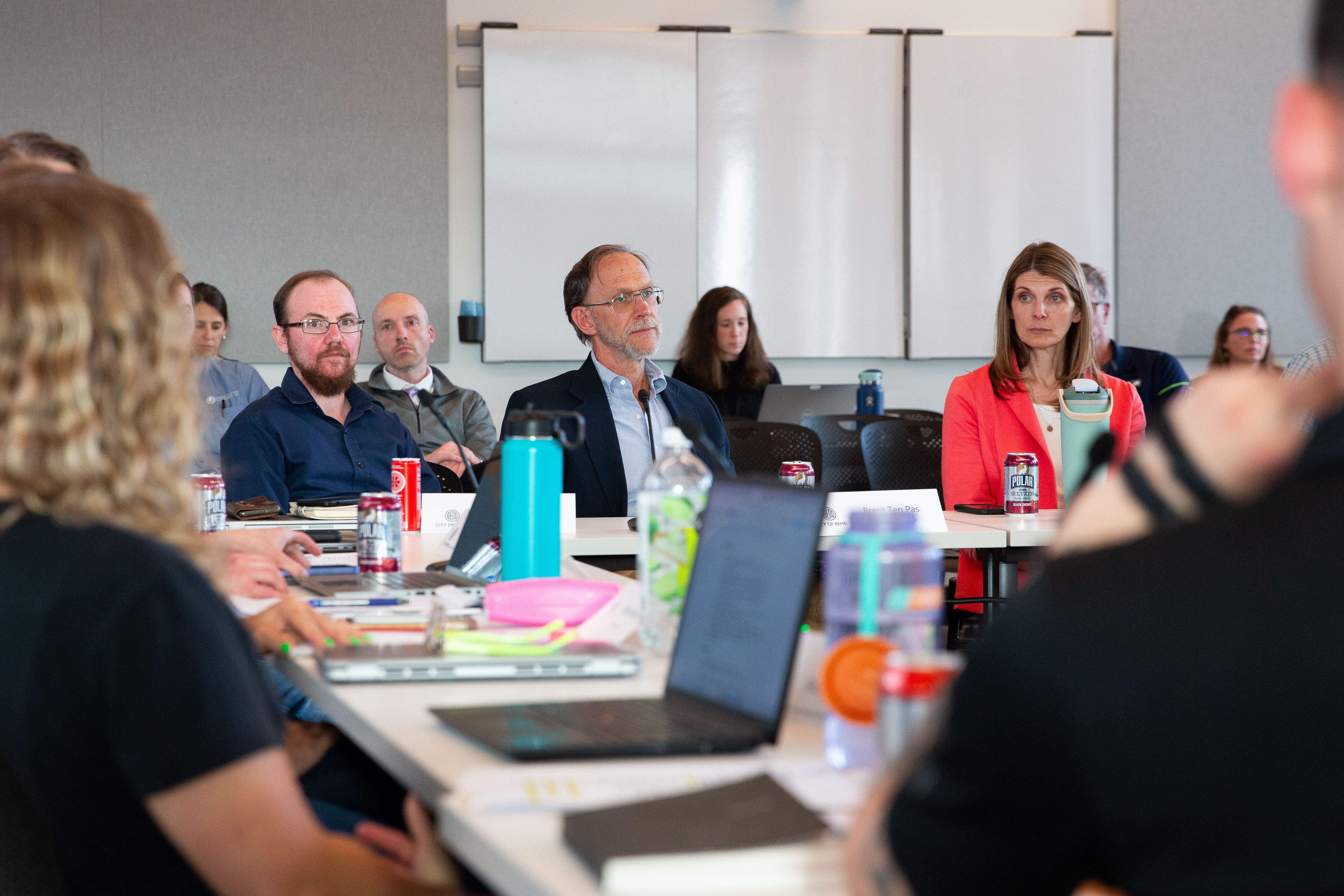 Representatives from Cascade Natural Gas, Central Electric Cooperative, Inc., and Pacific Power attend the electrification policy discussion in Bend, Ore., on April 8, 2026. Pacific Power representative (far right) Alisa Dunlap said the energy company's infrastructure is "tapped out" due to demand in the region.