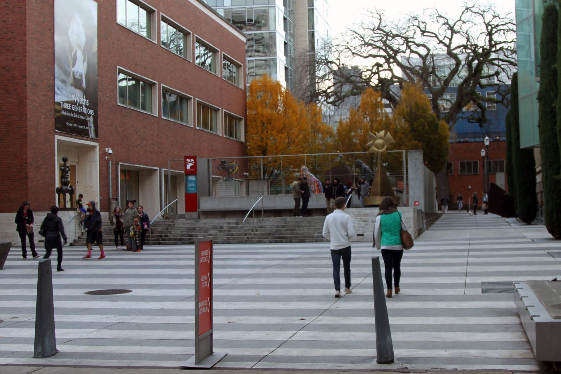 Currently, the stretch of Madison Street between the museum's two buildings serves as a plaza, passageway, and sculpture garden. The only ramp entry to the museum is hidden behind the stairs.
