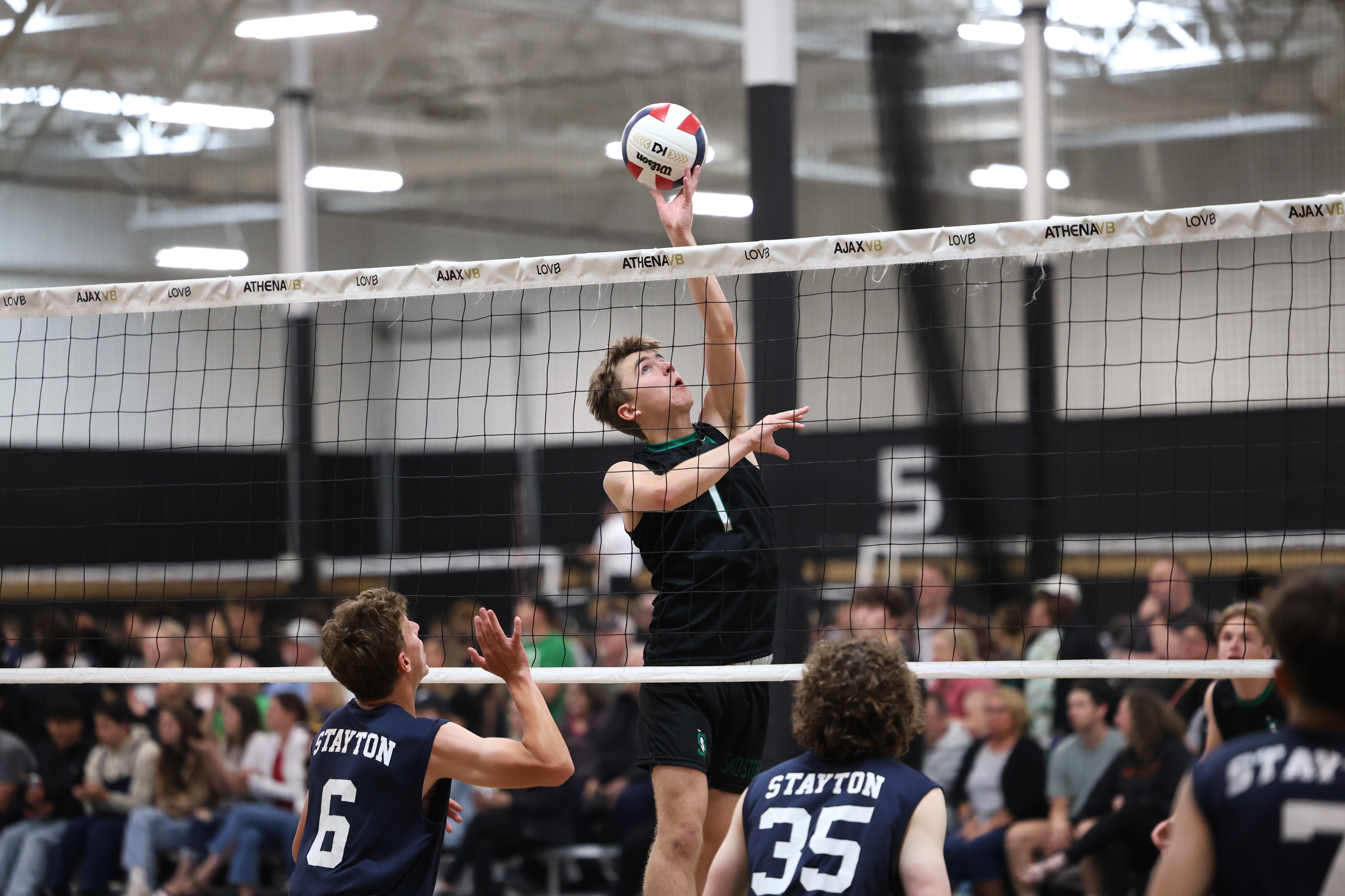 Summit High School’s Aiden Woods returns a ball during the 2024 Boys Volleyball State Championship at Olympus Sports Center in Hillsboro, Ore., on June 1, 2024.