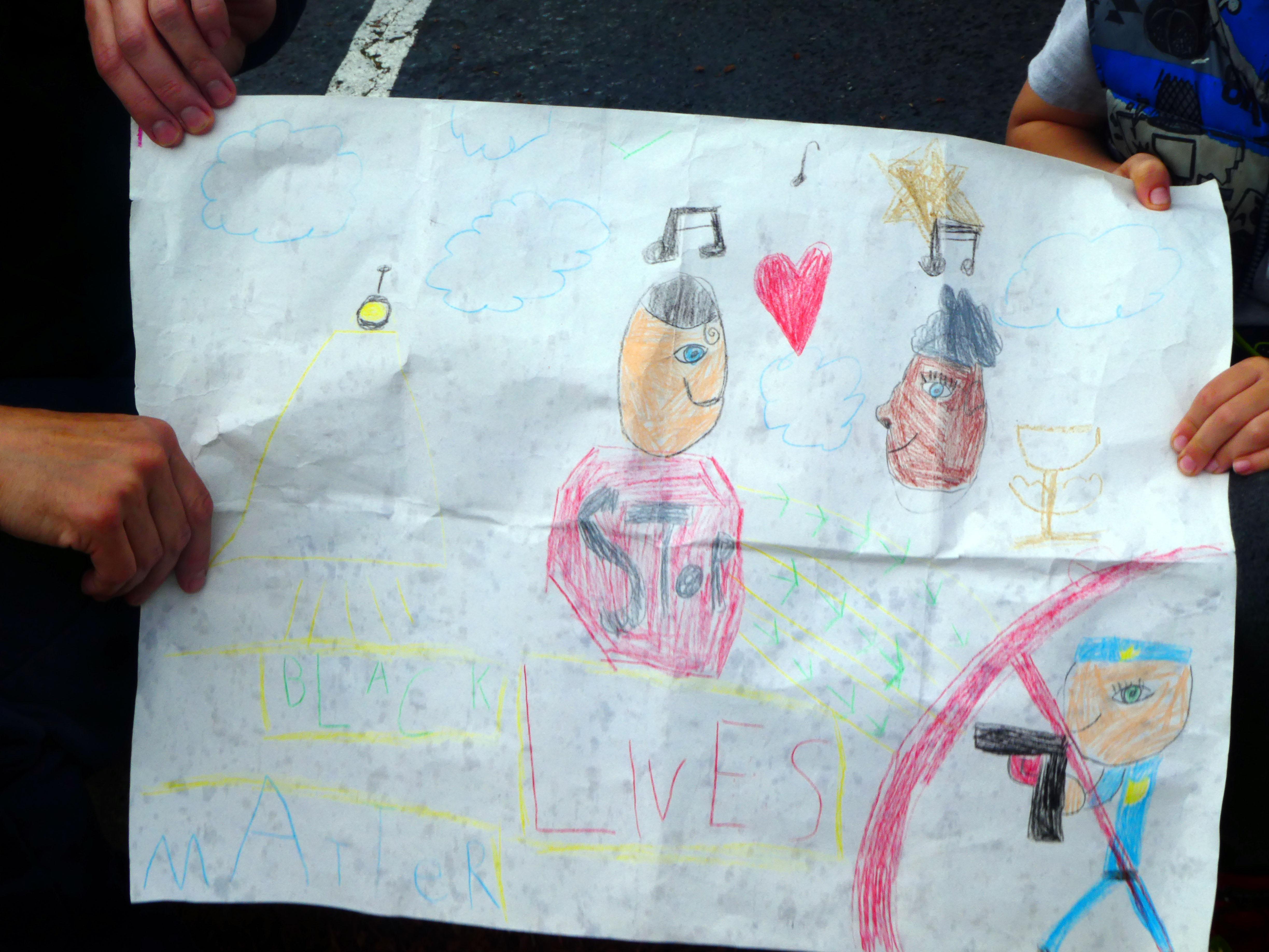 Six-year-old Rio Pederson showed up at a family-friendly Northeast Portland protest on June 7, 2020, with a hand-drawn sign, accompanied by his father.