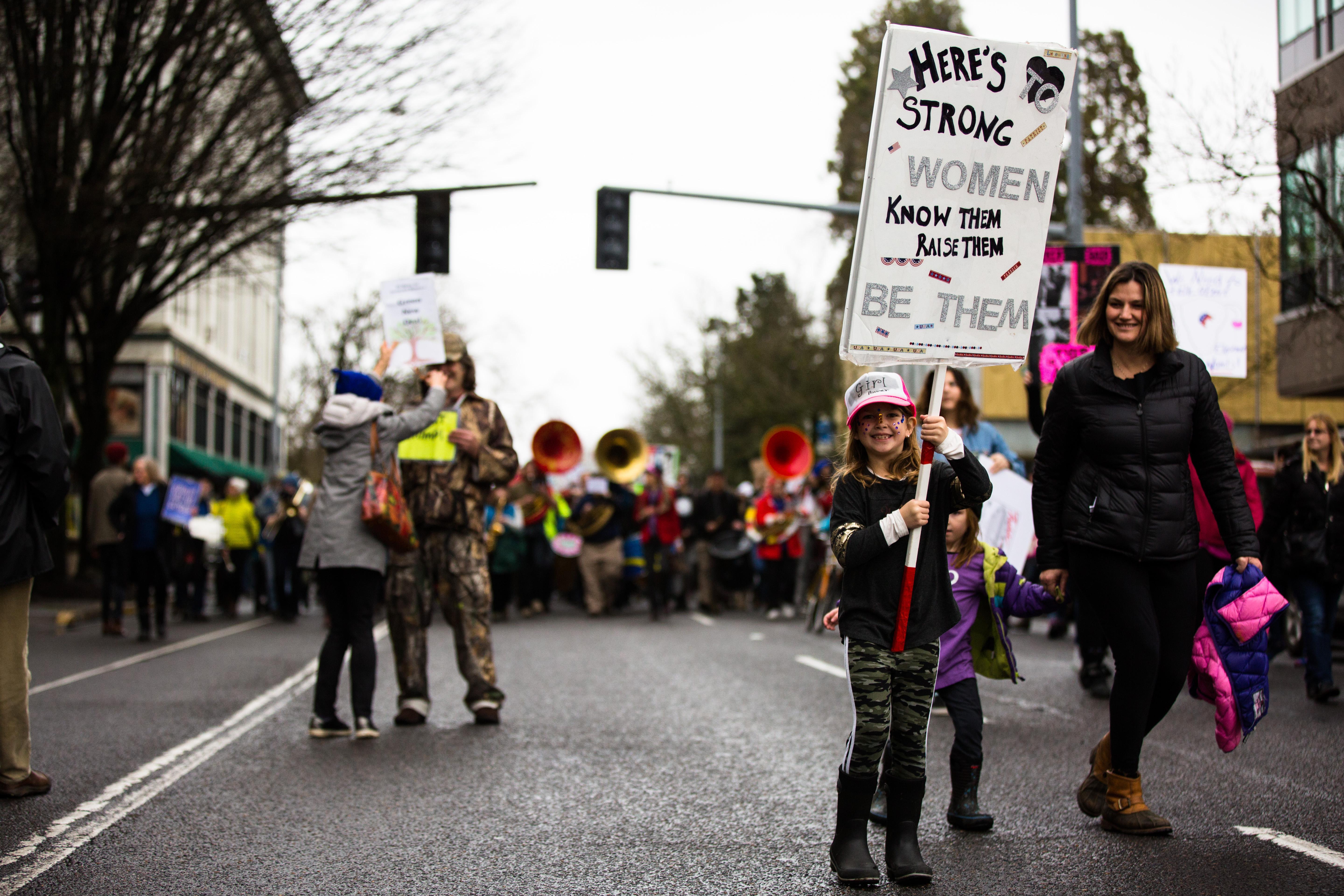 The 2019 Women's March moves through the streets of Eugene, Ore., Saturday, Jan. 19, 2019.