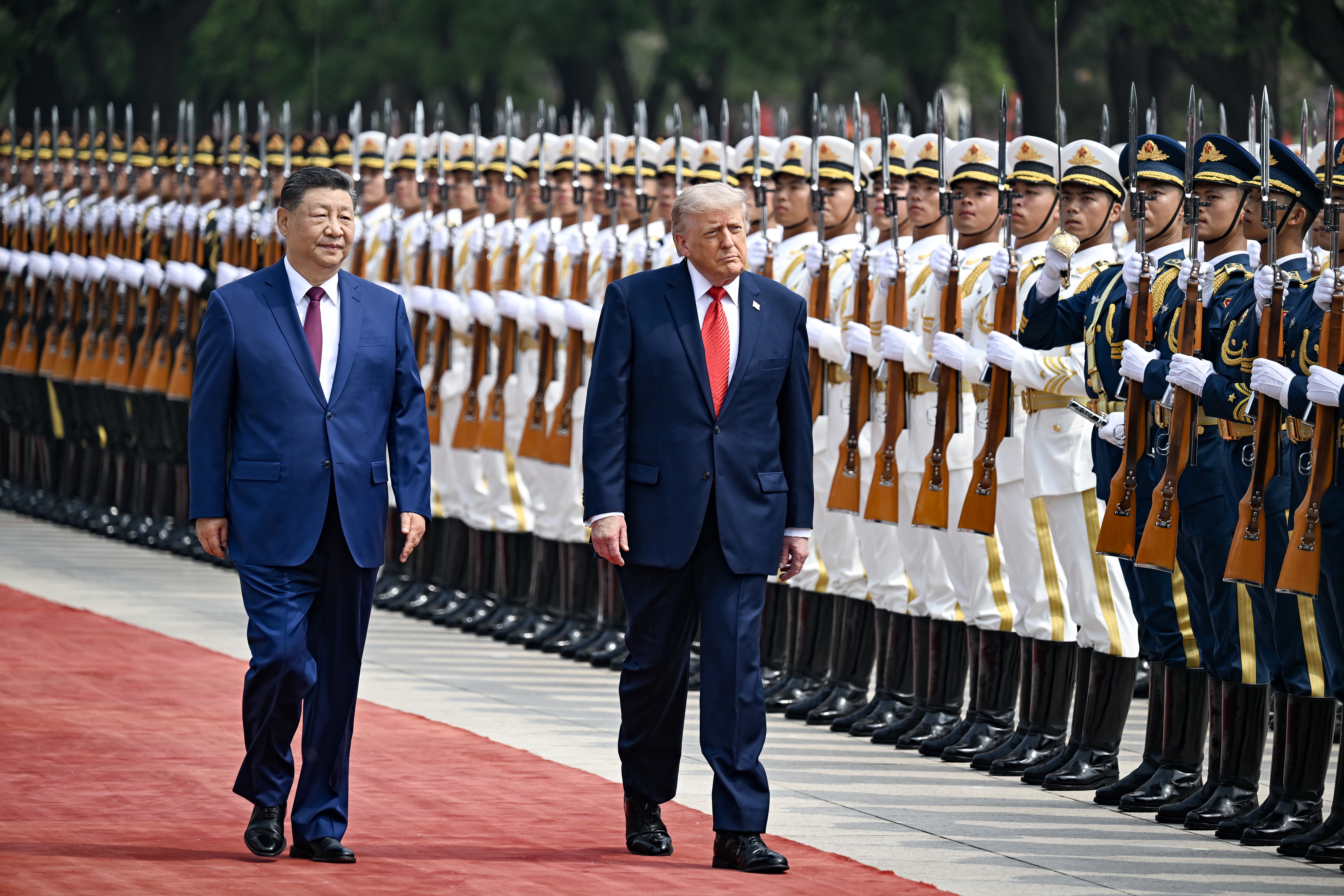 President Trump reviews an honor guard with Chinese President Xi Jinping during a welcome ceremony at the Great Hall of the People on May 14 in Beijing.