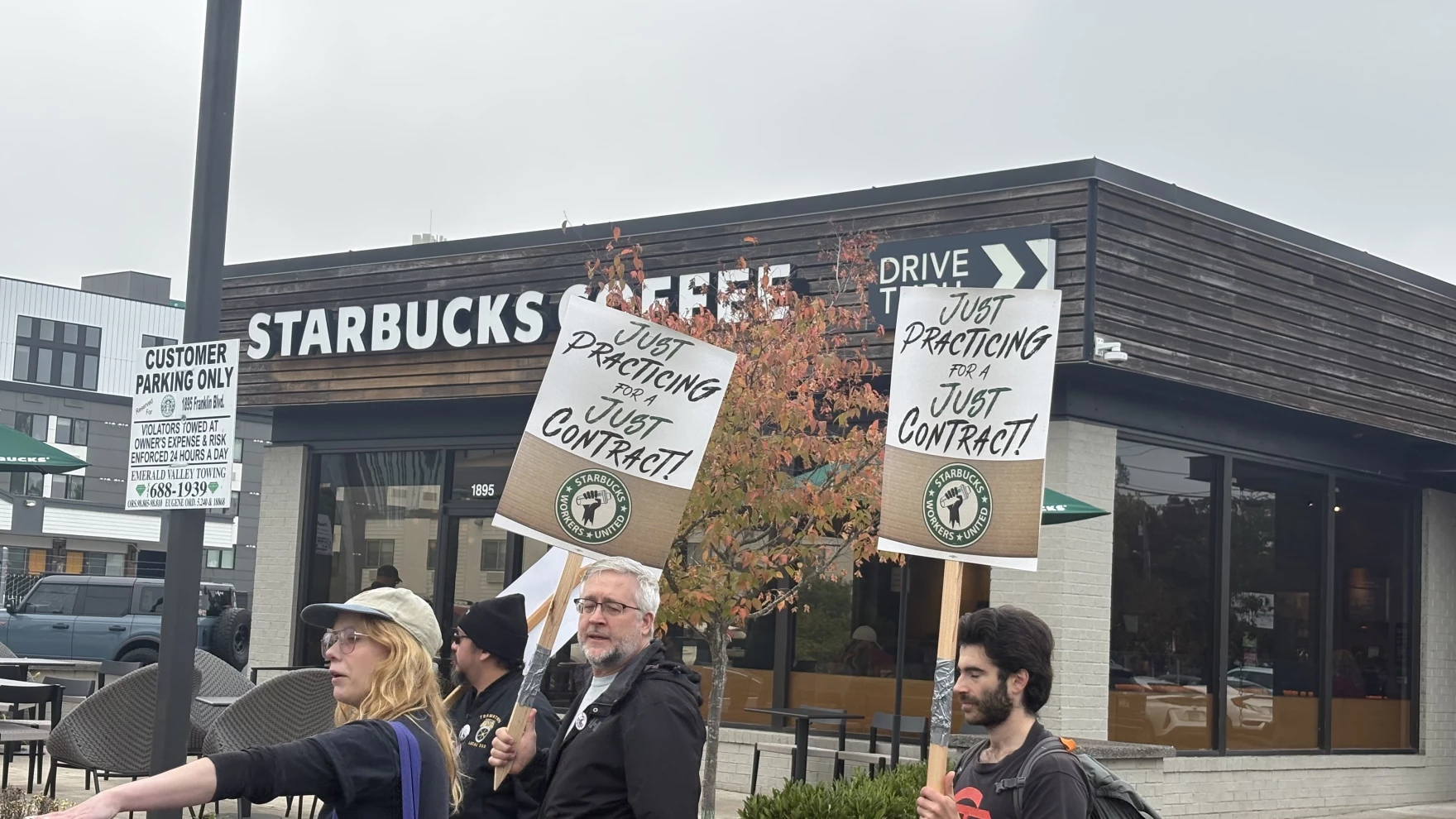 Unionized Starbucks workers in Eugene, Ore., met at one of the company's locations on Oct. 3, 2025 for a practice picket demanding the finalization of a fair contract.