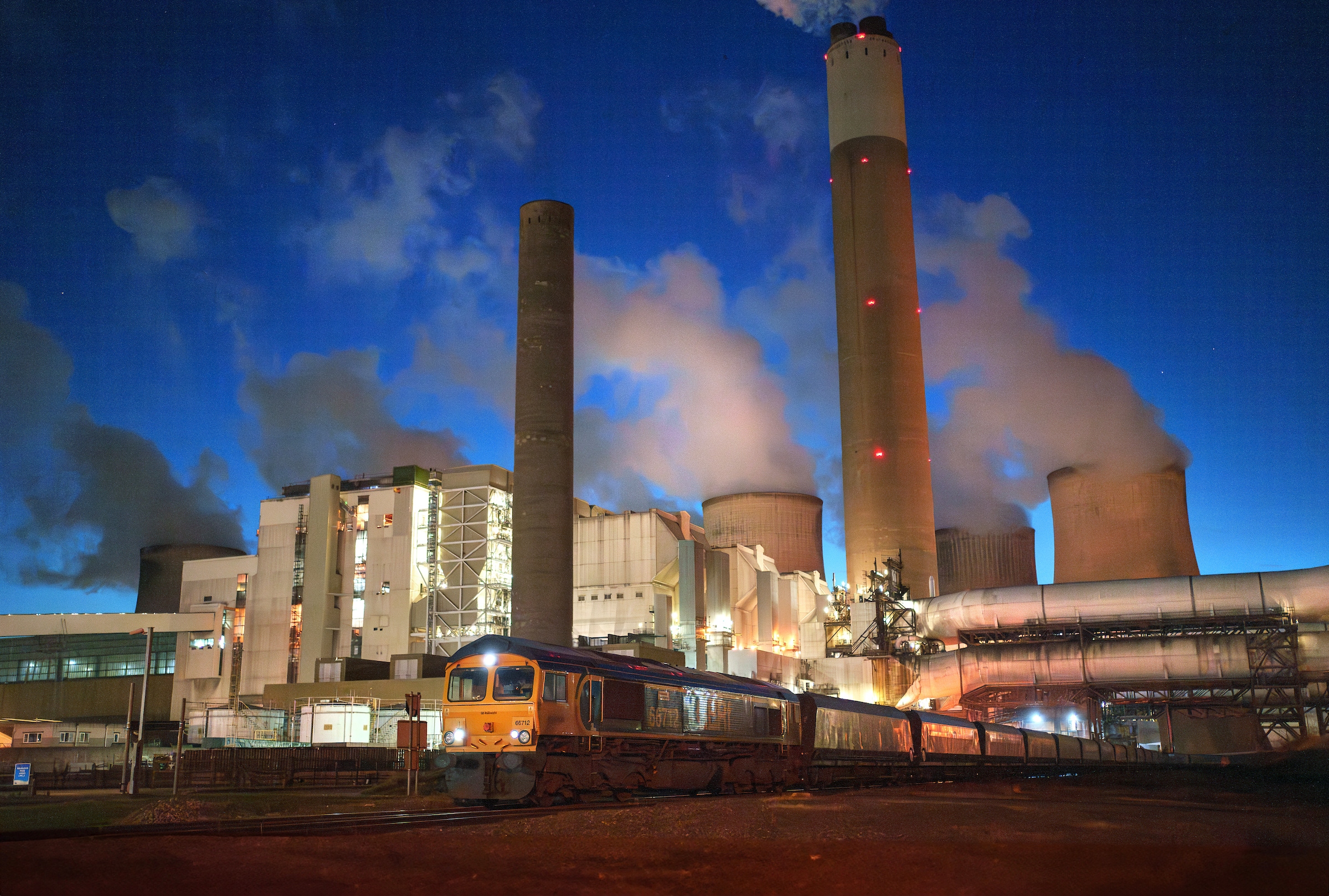 A train delivers coal by night at the Ratcliffe-on-Soar power station in Nottinghamshire, England. In its heyday, the plant received more than 20 truckloads of coal per day. 