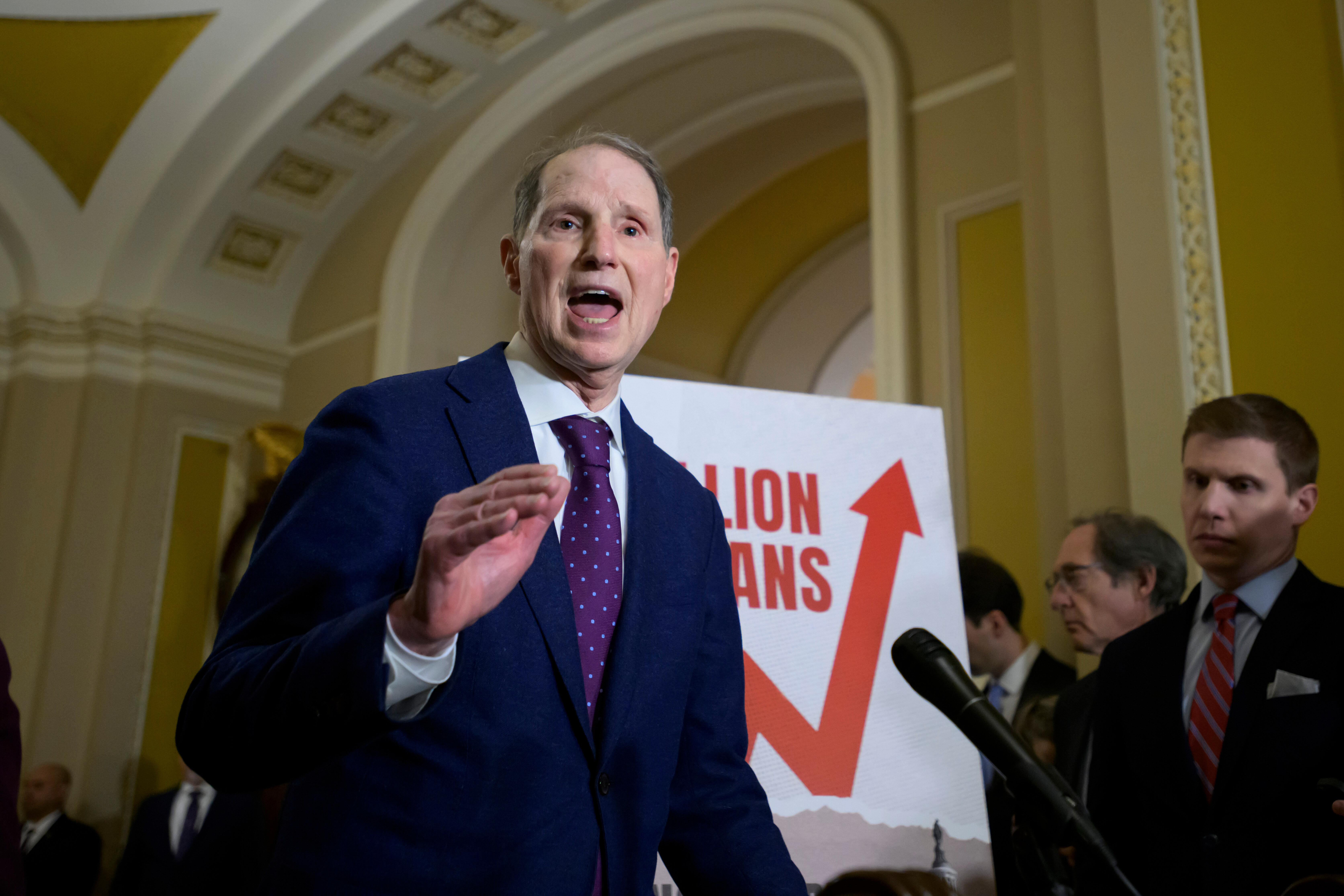 FILE - Sen. Ron Wyden, D-Ore., speaks during the Senate Democrat policy luncheon news conference at the Capitol, Dec. 2, 2025, in Washington.