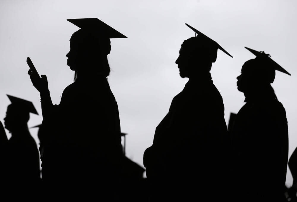New graduates line up before the start of the Bergen Community College commencement in East Rutherford, N.J, May 2018. The "One Big Beautiful Bill” contains proposals that could significantly reshape the higher education landscape, change how some Oregon students pay for college, and how graduates pay back their student loans.