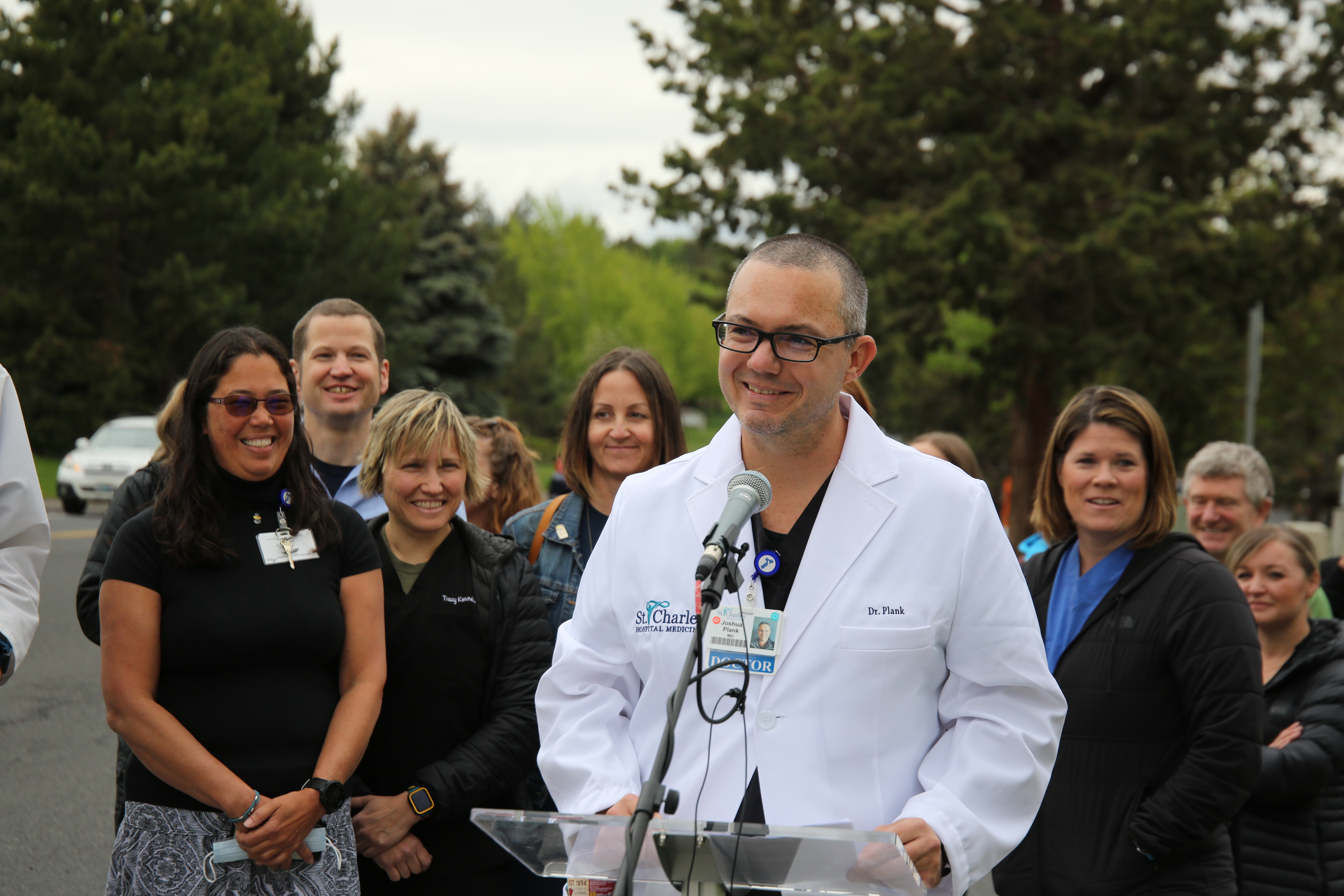Dr. Joshua Plank speaks outside St. Charles Medical Center in Bend, where a group of providers announced June 3, 2022 they intended to form a union.