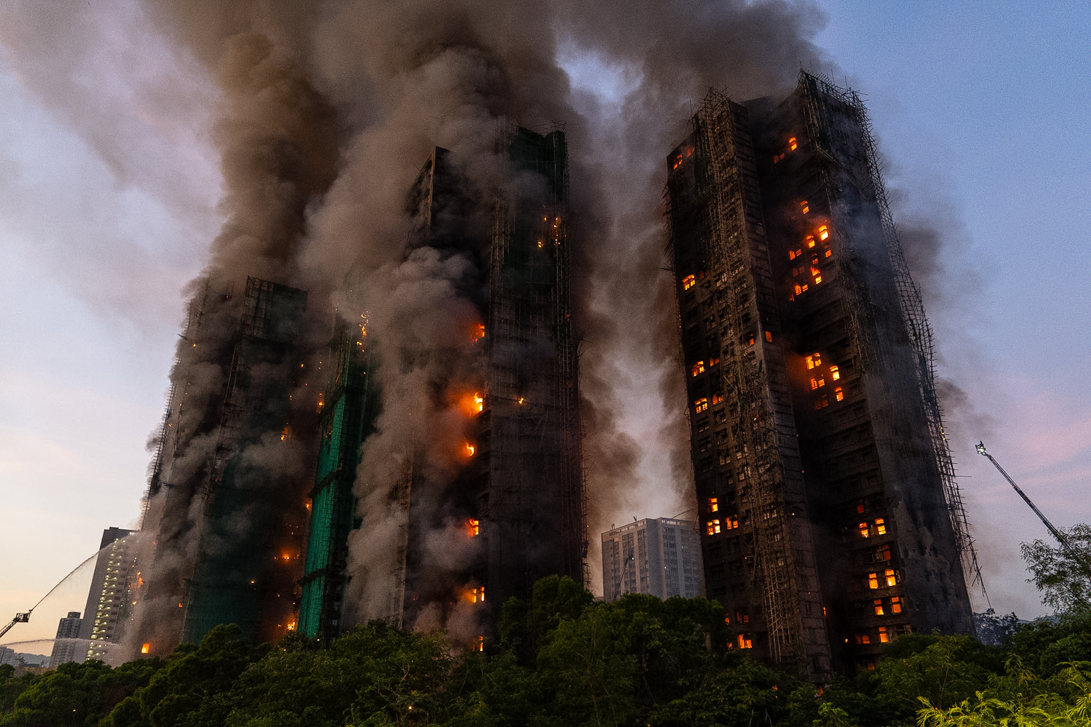 13 people killed in fire engulfing Hong Kong high-rise residential ...