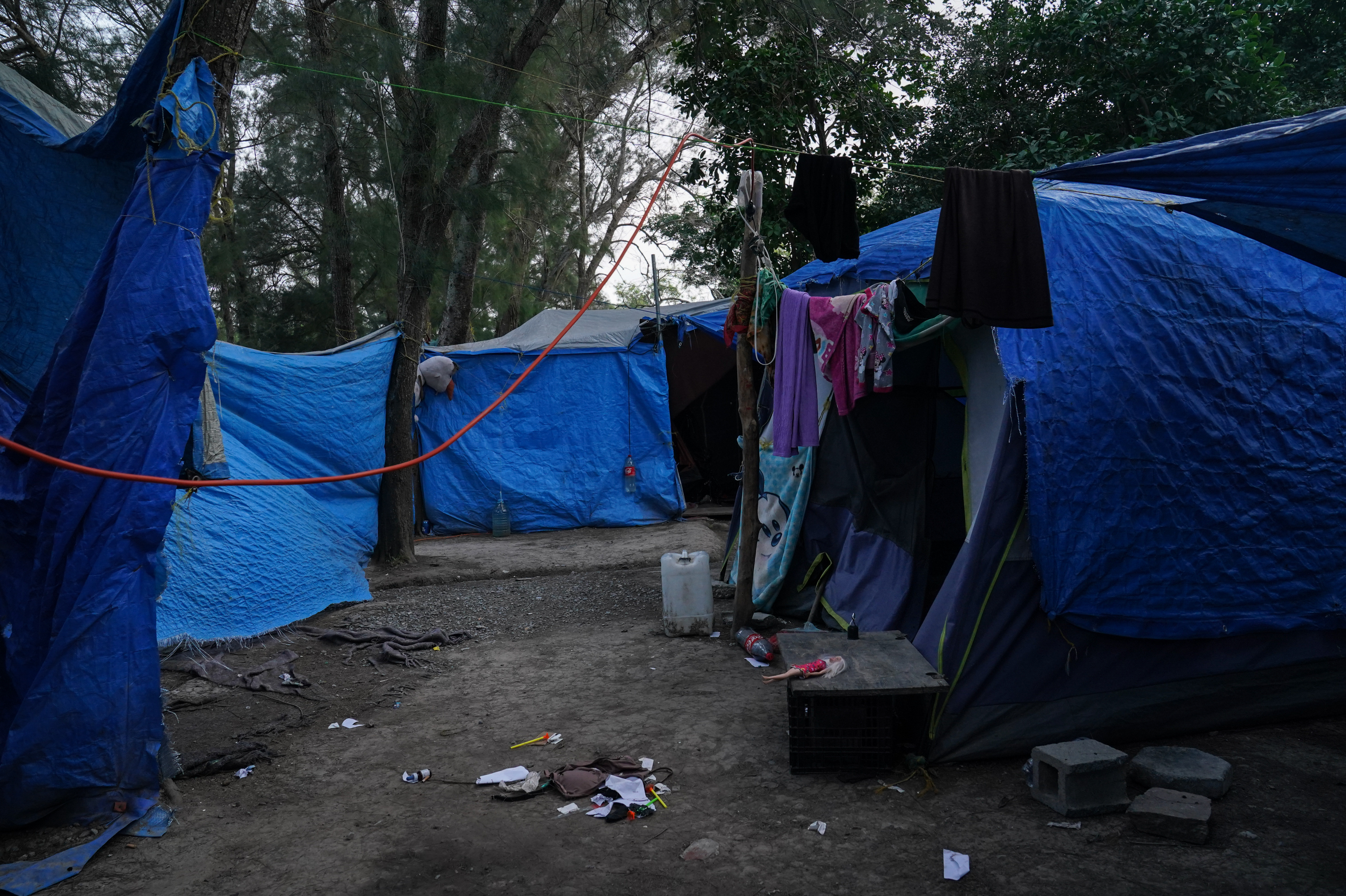 Abandoned tents remain at the migrant camp in Matamoros, Mexico, that is at the center of a controversy involving viral images of a flyer encouraging migrants to vote for President Biden.