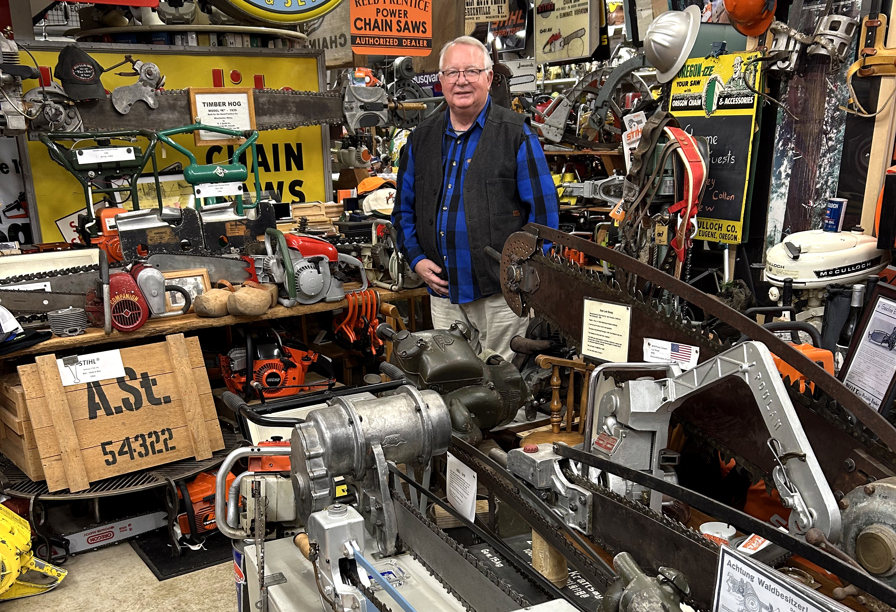 Wayne Sutton, founder and curator of Wayne's Chainsaw Museum, poses for a photograph on Jan. 23, 2026, inside the museum located in Clark County. The private museum has been open since 2000 and is free to attend by appointment only. It features about half of the 4,000 or 5,000 chainsaws Sutton has collected or has had donated to him over the years.