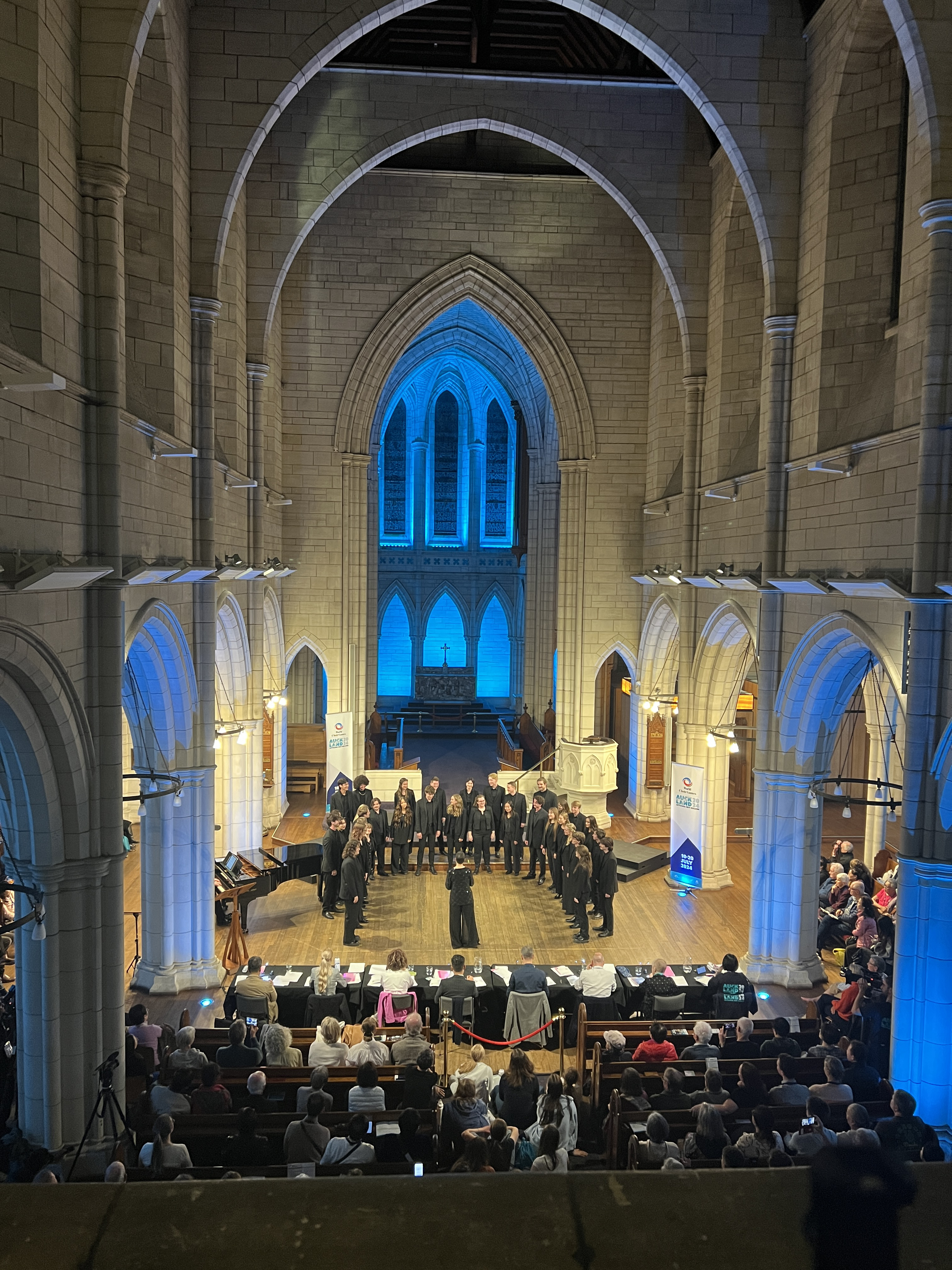 A choir performs in a church as part of the competition in the World Choir Games.