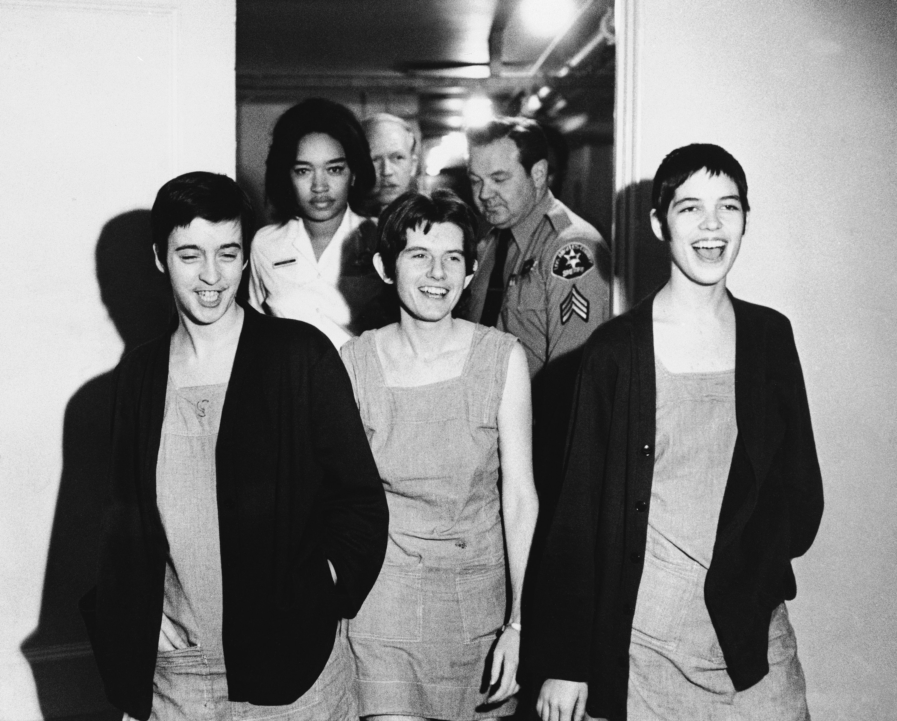From left: Susan Atkins, Patricia Krenwinkel and Leslie Van Houten, laugh as they walk to court in Los Angeles for sentencing on March 29, 1971.