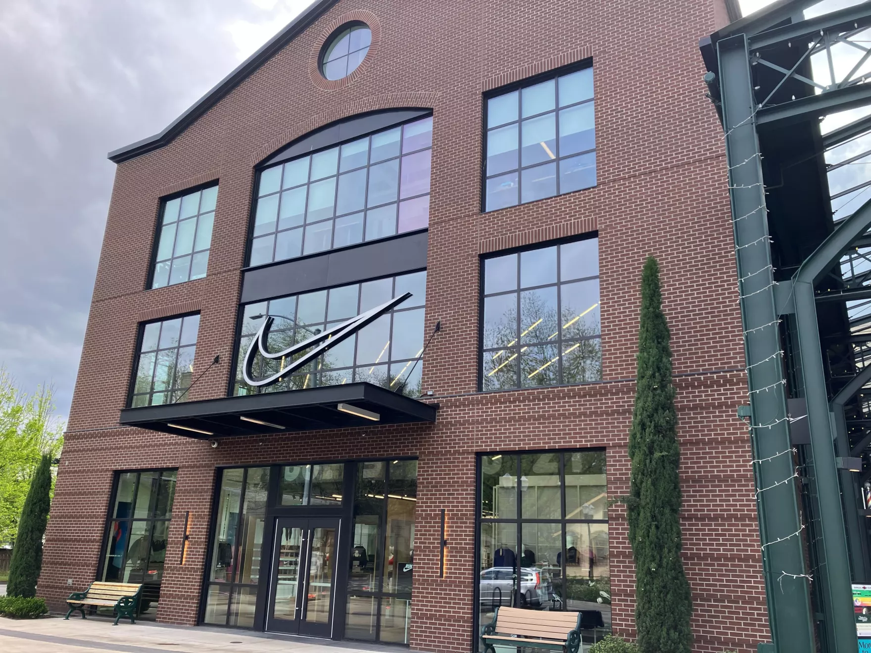 The Nike Store at 5th Street Market in Eugene, Ore., pictured on April 21, 2026. It's not yet confirmed whether Nike would be taxed under this initiative, but any company that makes more than $1 billion in national gross profits from retail sales annually and more than $500,000 from retail sales in Eugene would be included.