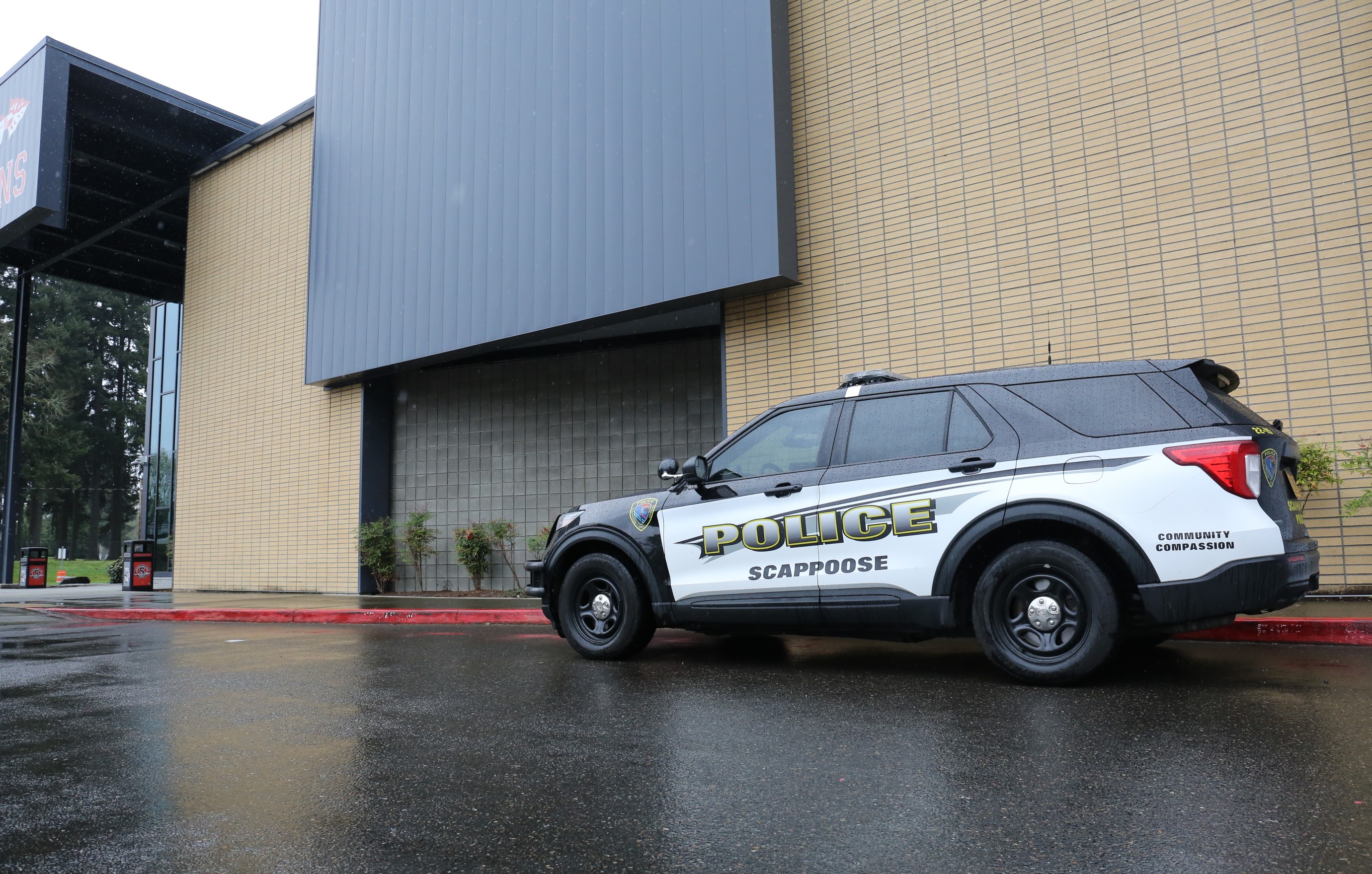 A Scappoose Police vehicle parked outside Scappoose High School on April 7, 2024. The Scappoose City Council is considering eliminating its police department and contracting with the Columbia County Sheriff's Office.