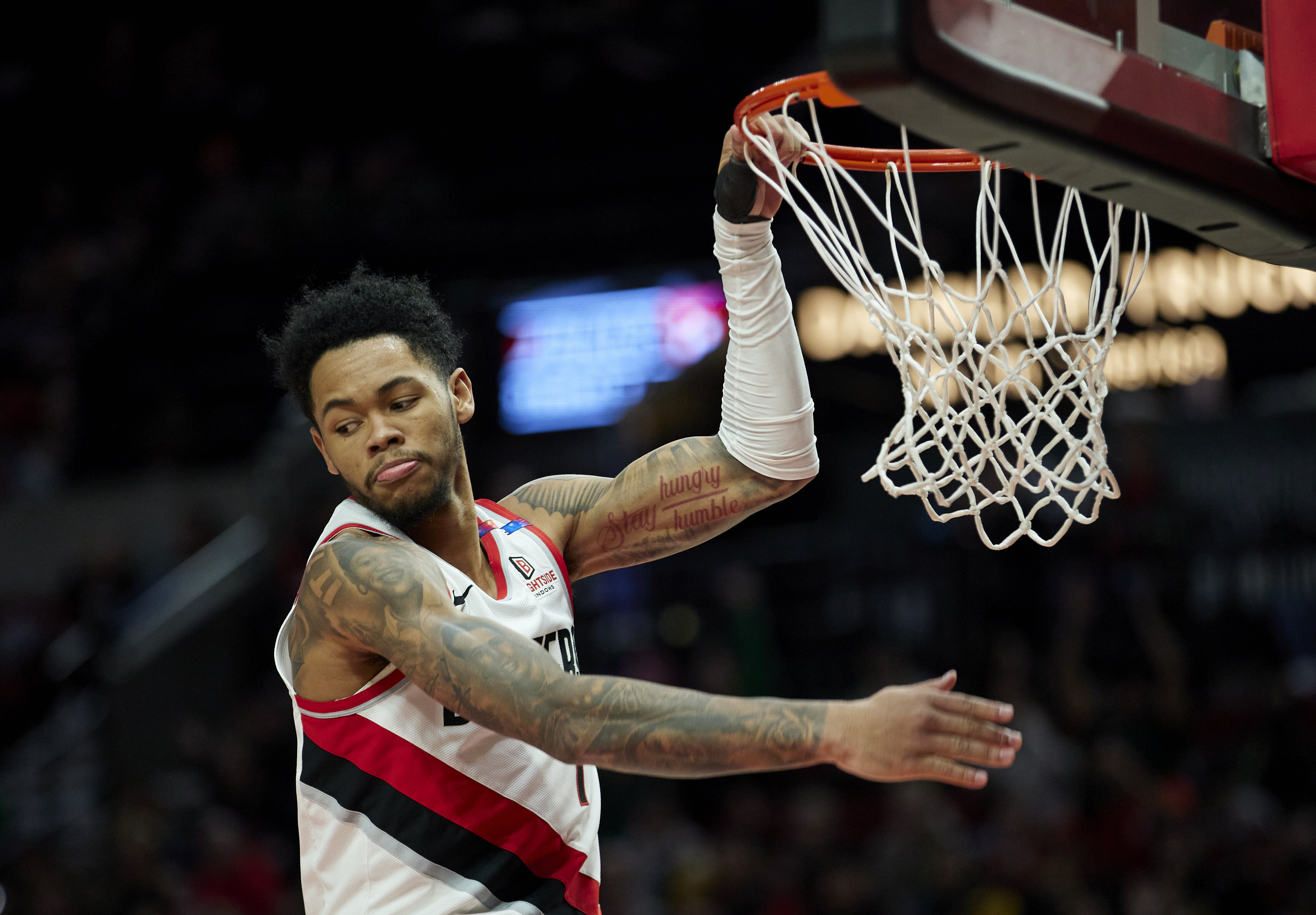 Portland Trail Blazers guard Anfernee Simons dunks against the Washington Wizards during the second half of an NBA basketball game in Portland, Ore., Monday, March 17, 2025.