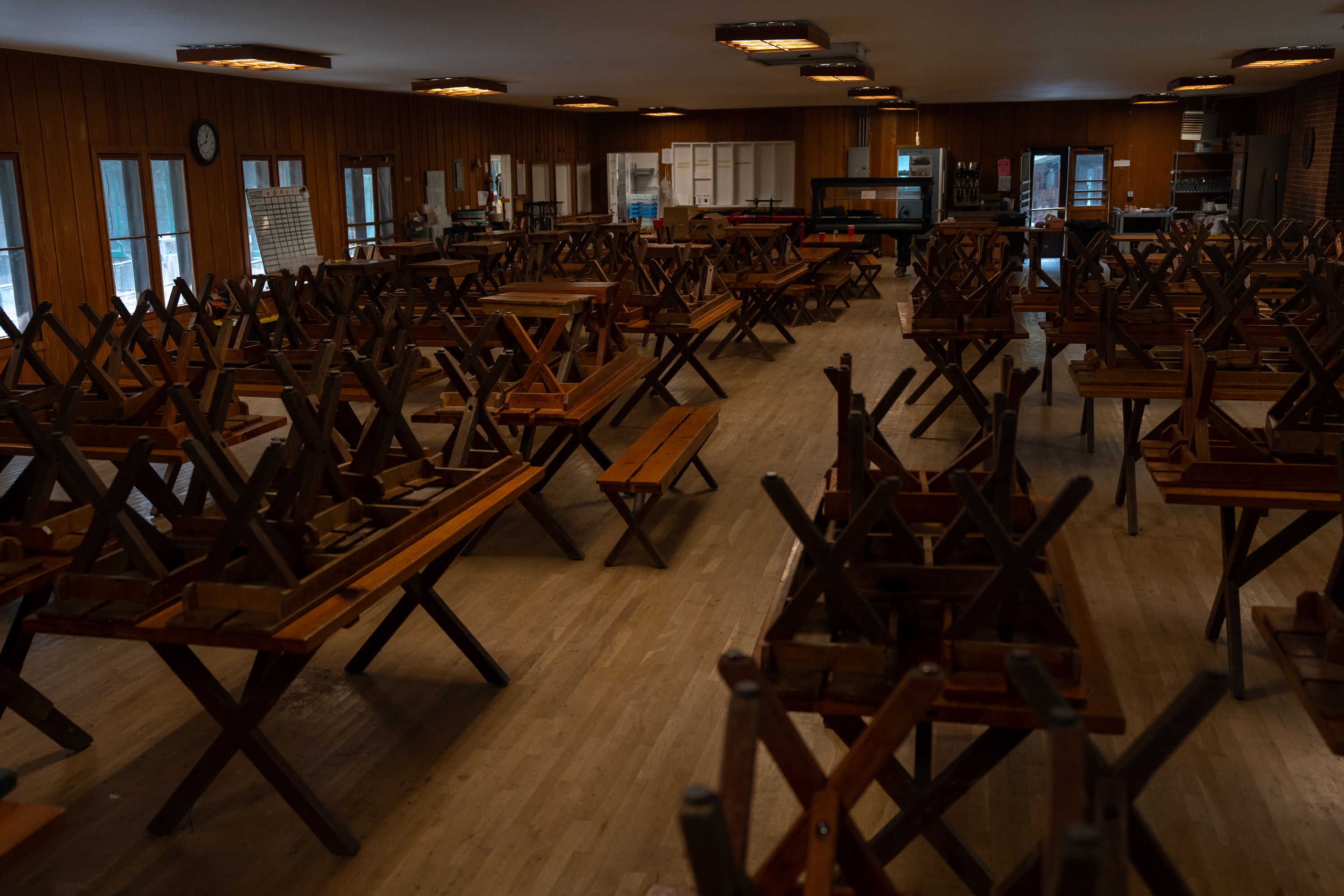Chairs and tables are stacked in the dining hall at the 103-year-old camp.