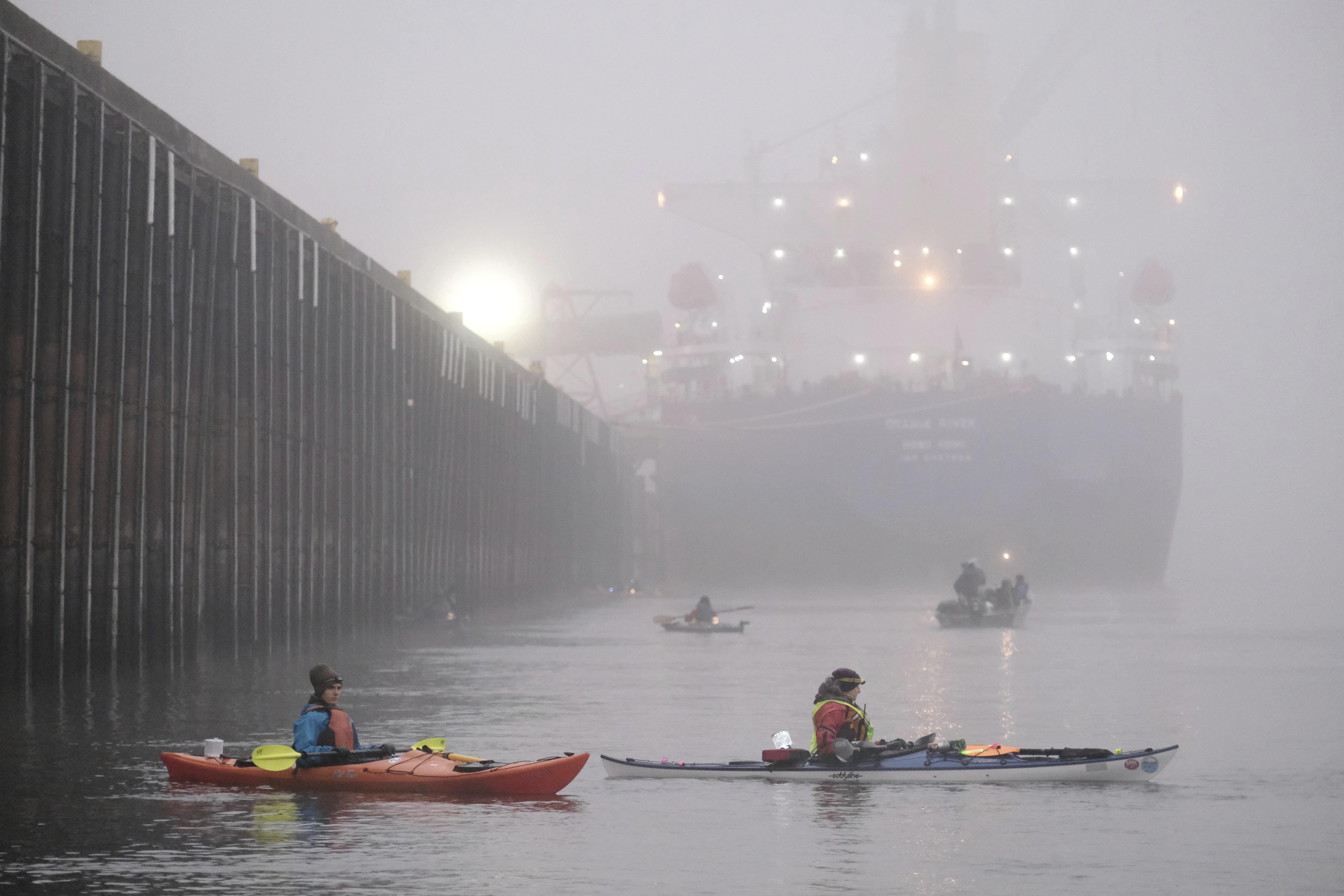 Activists with Portland Rising Tide and the Mosquito Fleet prevent the bulk carrier Patagonia from docking at the Port of Vancouver, Wash., on November 5, 2019.