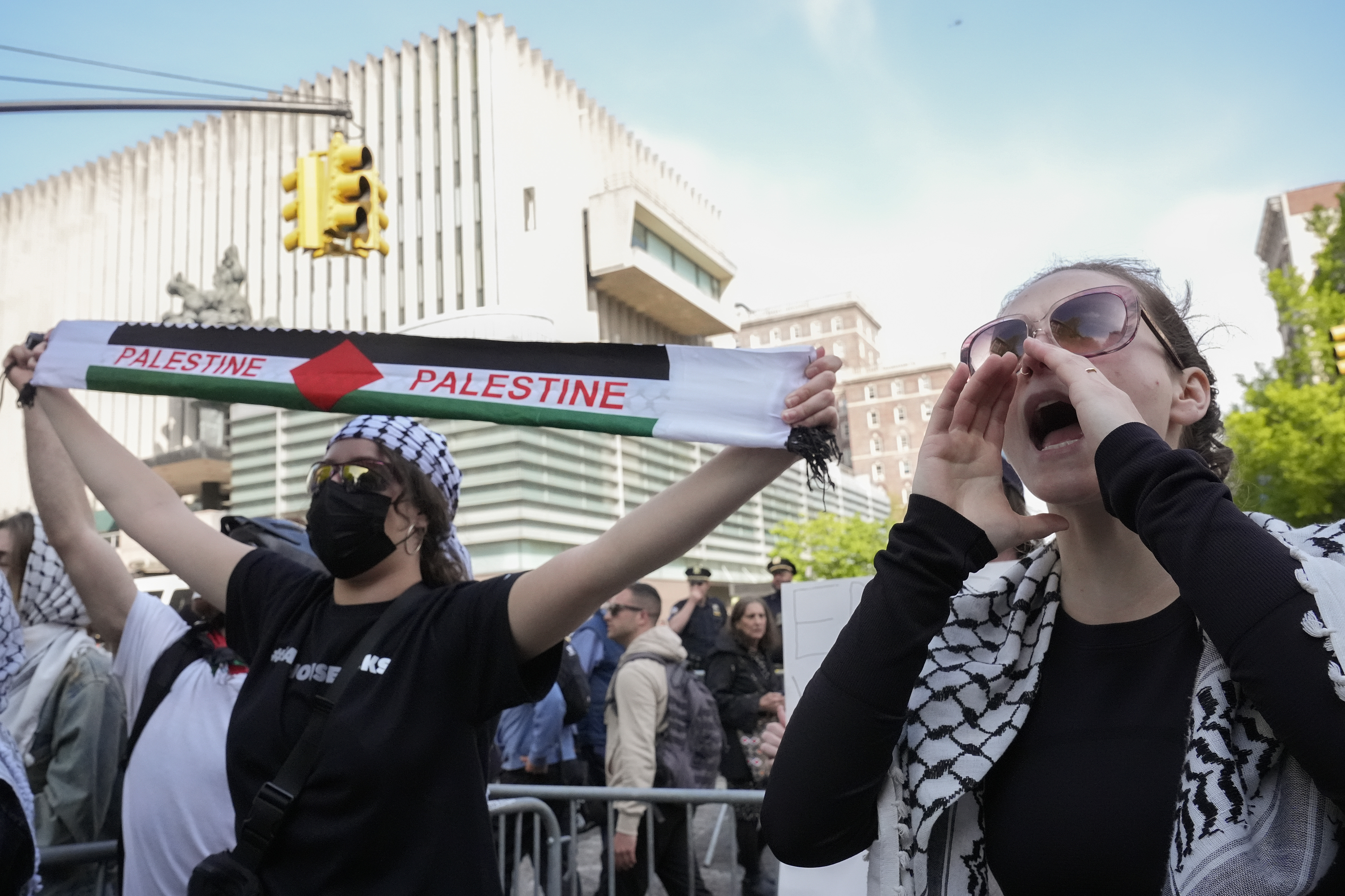Protesters demonstrate against the war in Gaza outside the entrance to the campus of Columbia University, Tuesday, April 30, 2024, in New York.