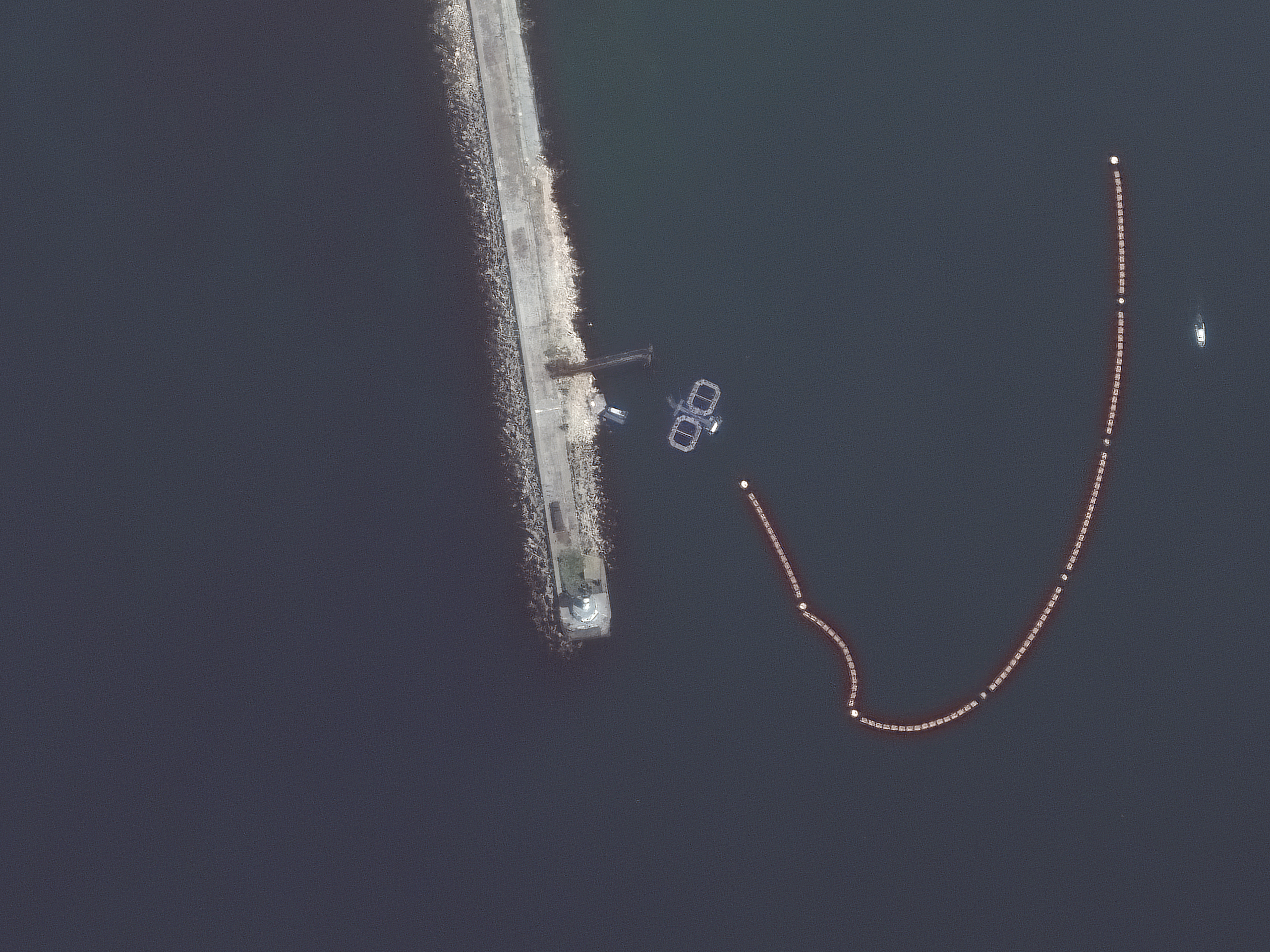 Satellite imagery captured by Maxar Technologies on Friday appears to show dolphin pens at the entrance to Sevastopol Harbor. The naval base there is important to the Russian military because of its proximity to the Crimean peninsula.