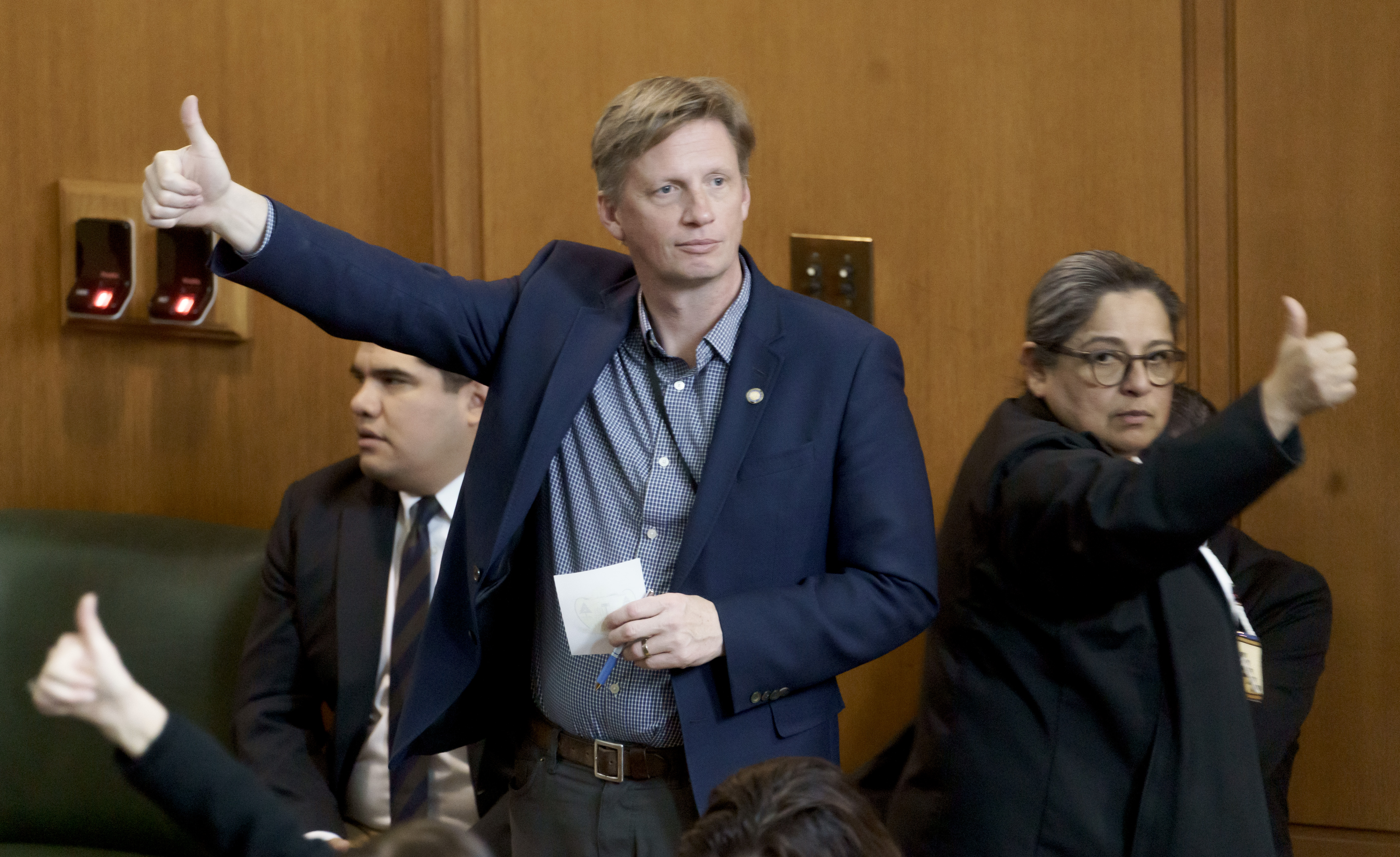 State Rep. Jason Kropf, D-Bend, left, has led an effort this year to alter the state's standards for civil commitment.