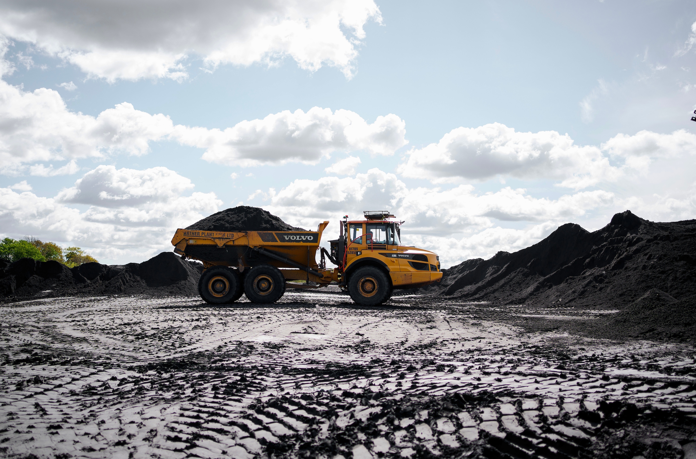 A truck hauls coal outside the Ratcliffe-on-Soar power station in Nottinghamshire, England.