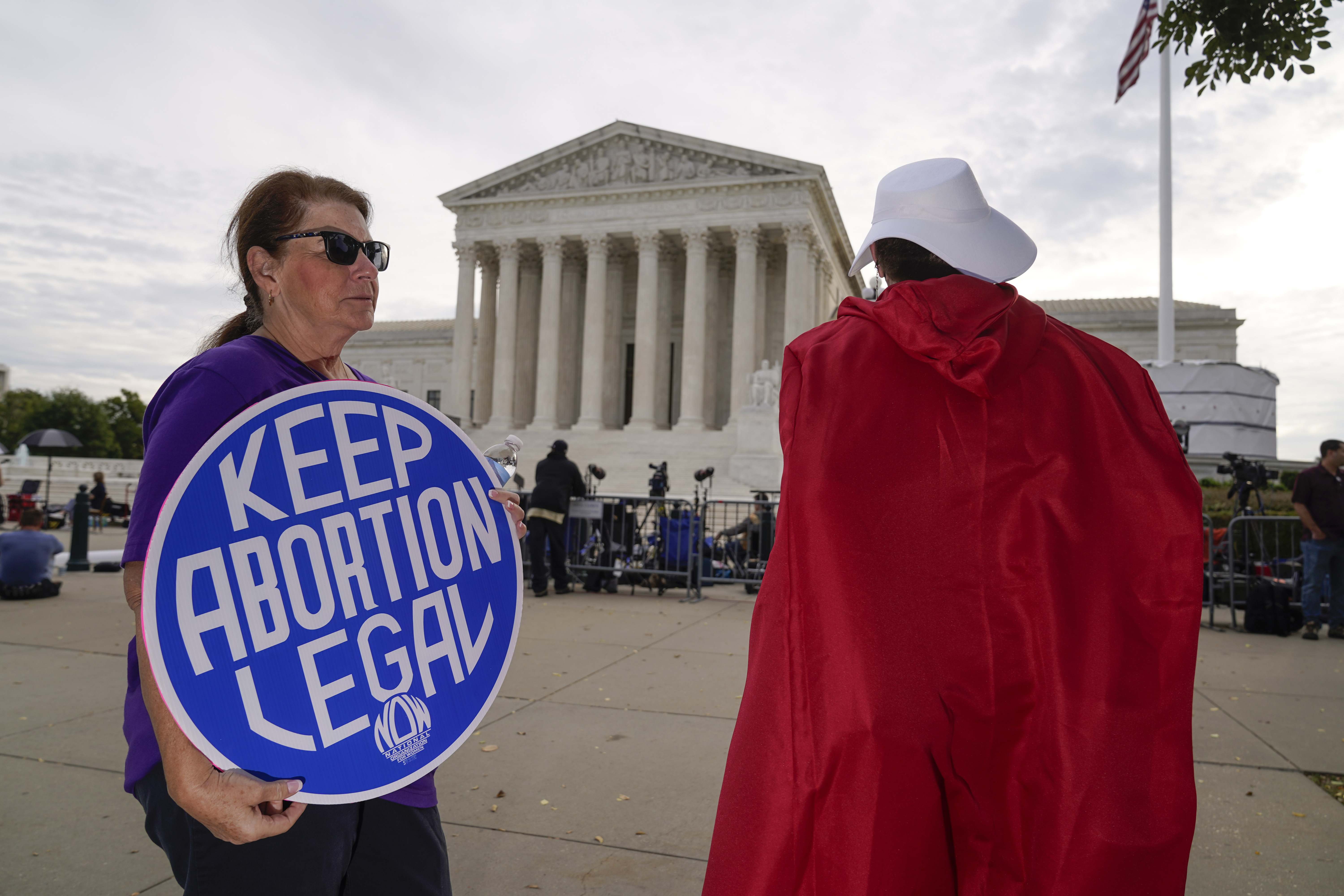 Judge orders Texas to suspend new law banning most abortions - OPB