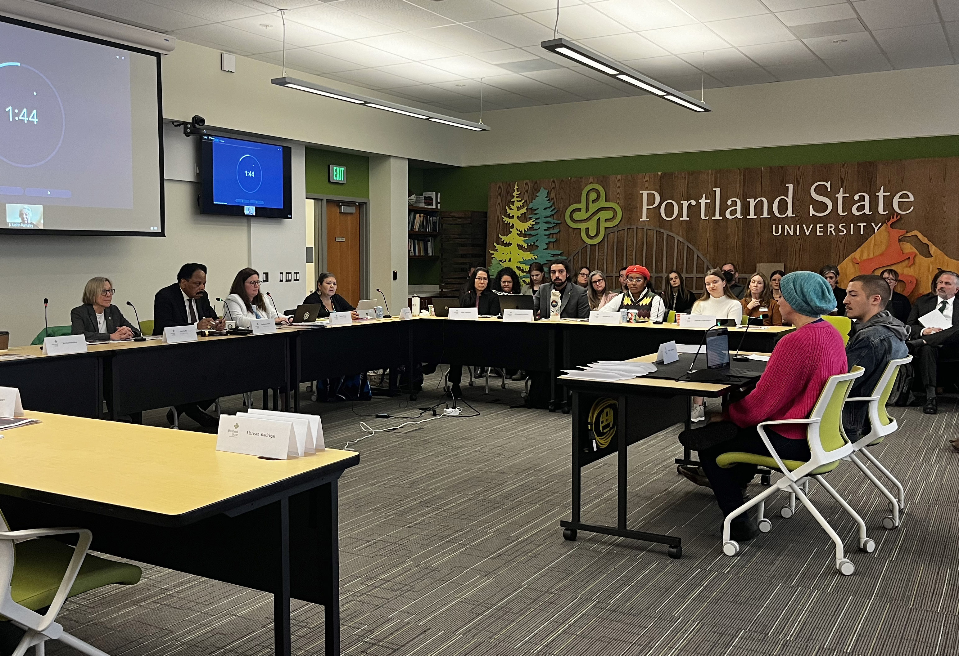Members of Portland State University's Board of Trustees listen to student and faculty concerns over administrators' plans to solve the university's budget crisis on Nov. 21, 2024.