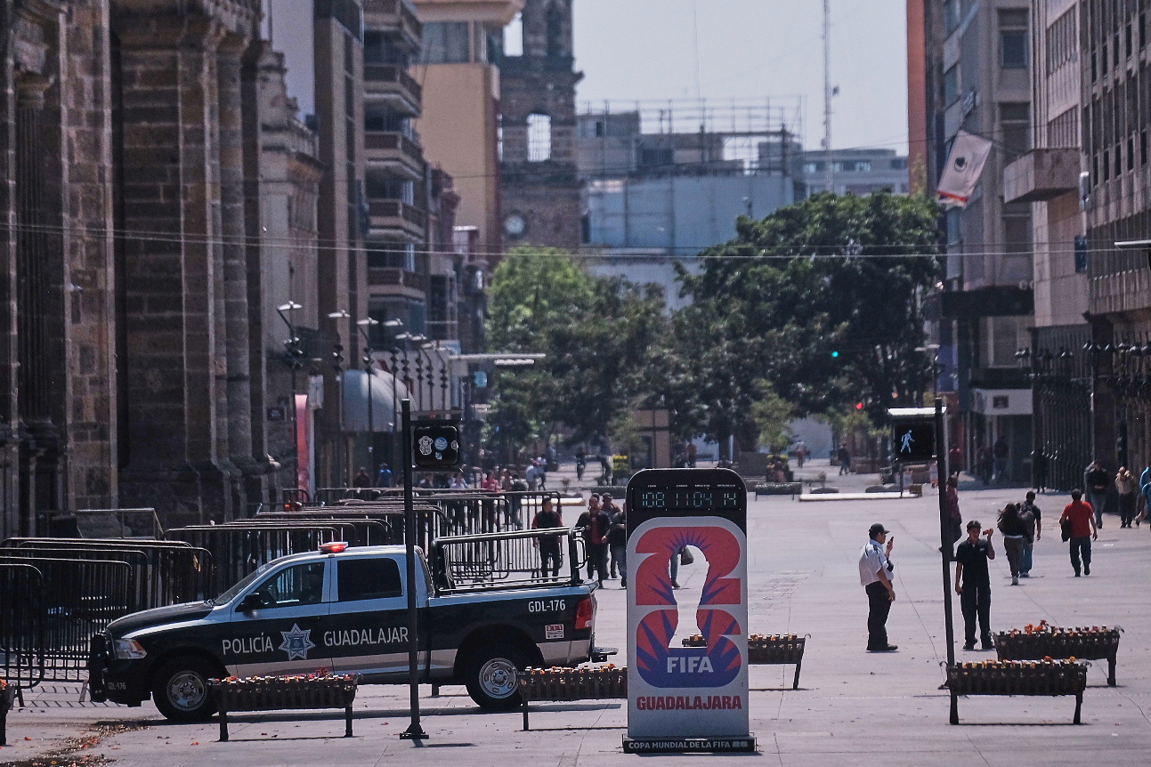 Police officers stand guard in downtown Guadalajara, Jalisco state, Mexico, Sunday, Feb. 22, 2026, after the death of the leader of the Jalisco New Generation Cartel, Nemesio Oseguera Cervantes, known as "El Mencho."