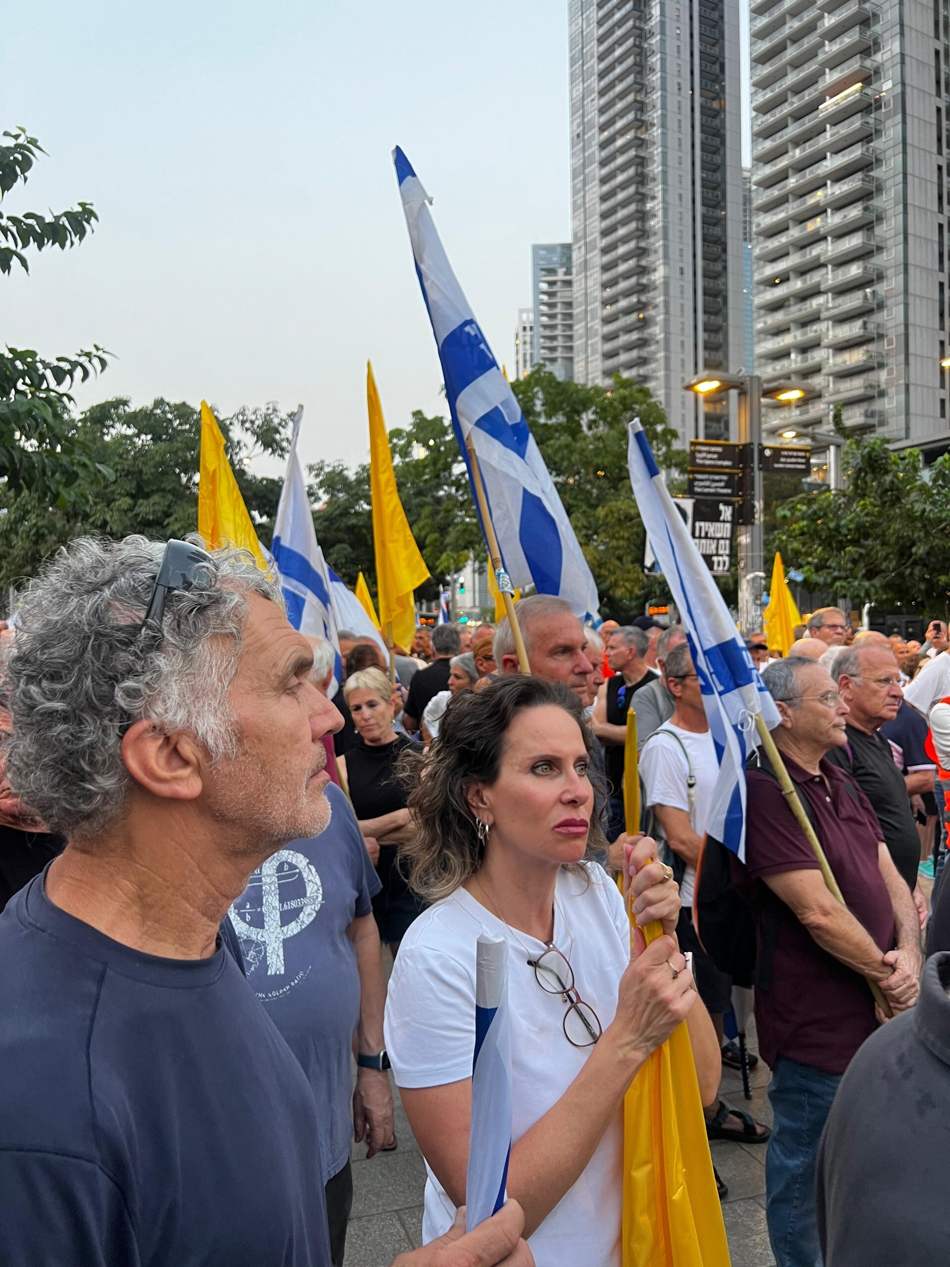 Retired Israeli Air Force officers protest against the war in Gaza outside the country's defense ministry headquarters in Tel Aviv on August 12, 2025