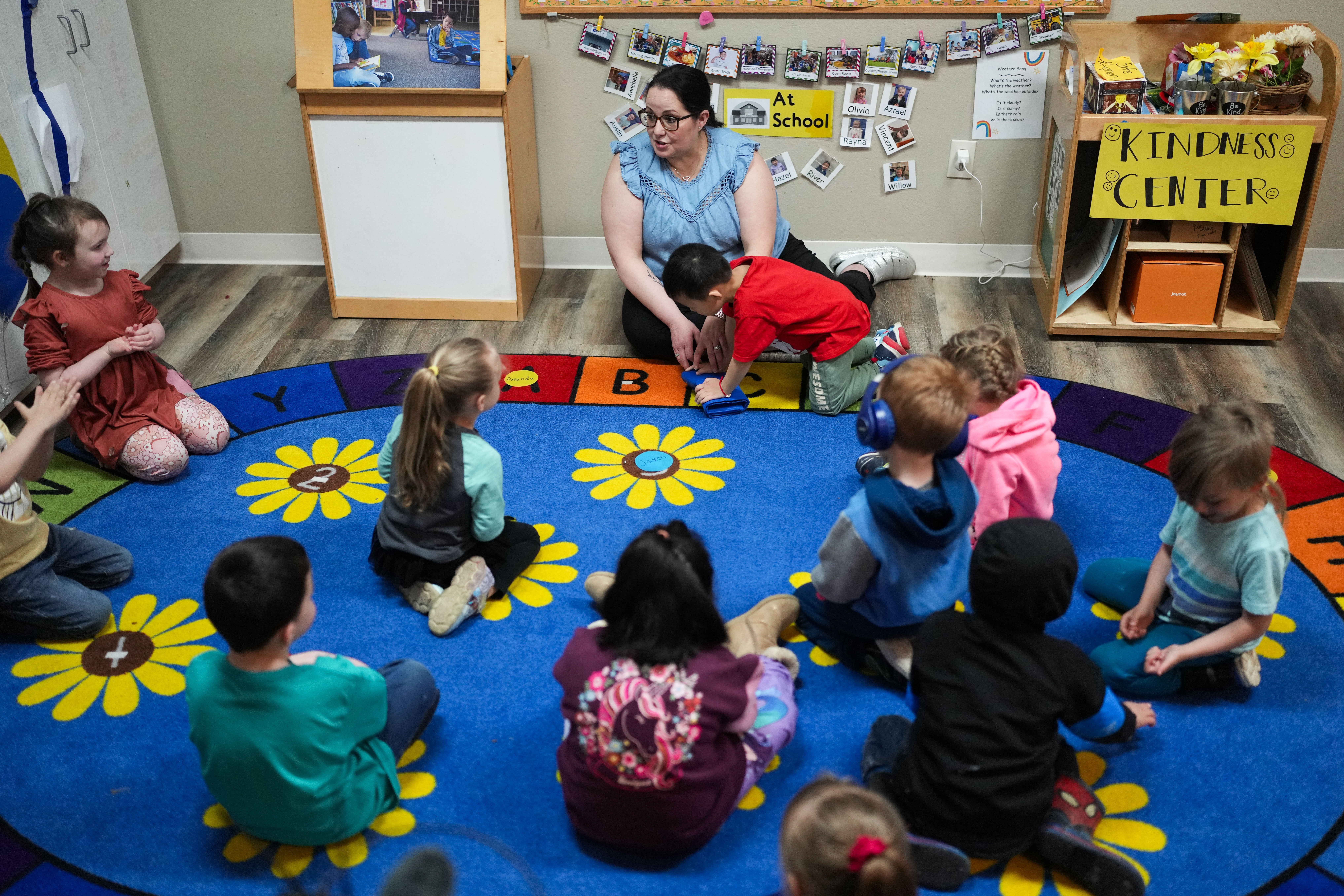 Family educator Lisa Benson-Nuyen addresses her students in a circle in the Northern Lights classroom at the Meadow Lakes CCS Early Learning, a Head Start center, in Wasilla, Alaska in 2024. The center has since closed because of a lack of staff and money.