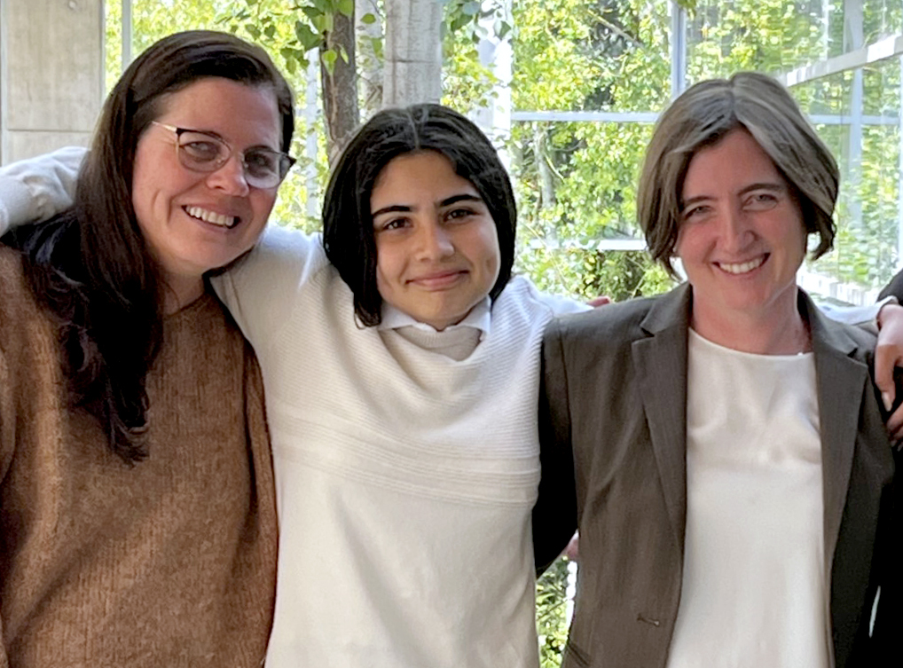 Elaine Kelsey, left, her child, Lior Onaly-Kelsey, center, and attorney Caitlin Mitchell, right, celebrate in Eugene, Ore., in Sept. 2023, after a federal jury concluded Greater Albany Public Schools and a former principal violated the U.S. Constitution, Title IX and Oregon law by discriminating against Onaly-Kelsey for their gender identity.