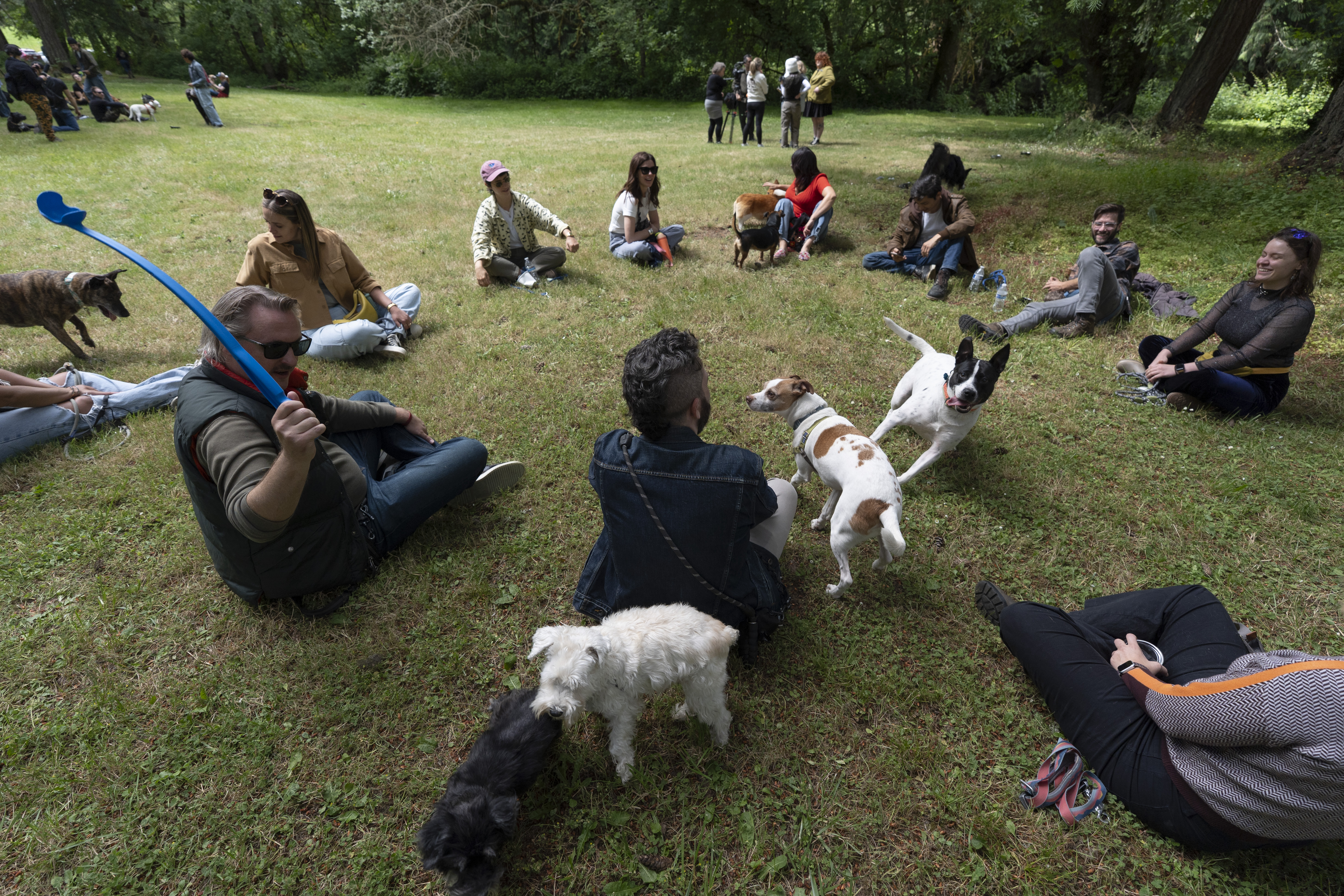 Participants form a circle as they wait to be interviewed.